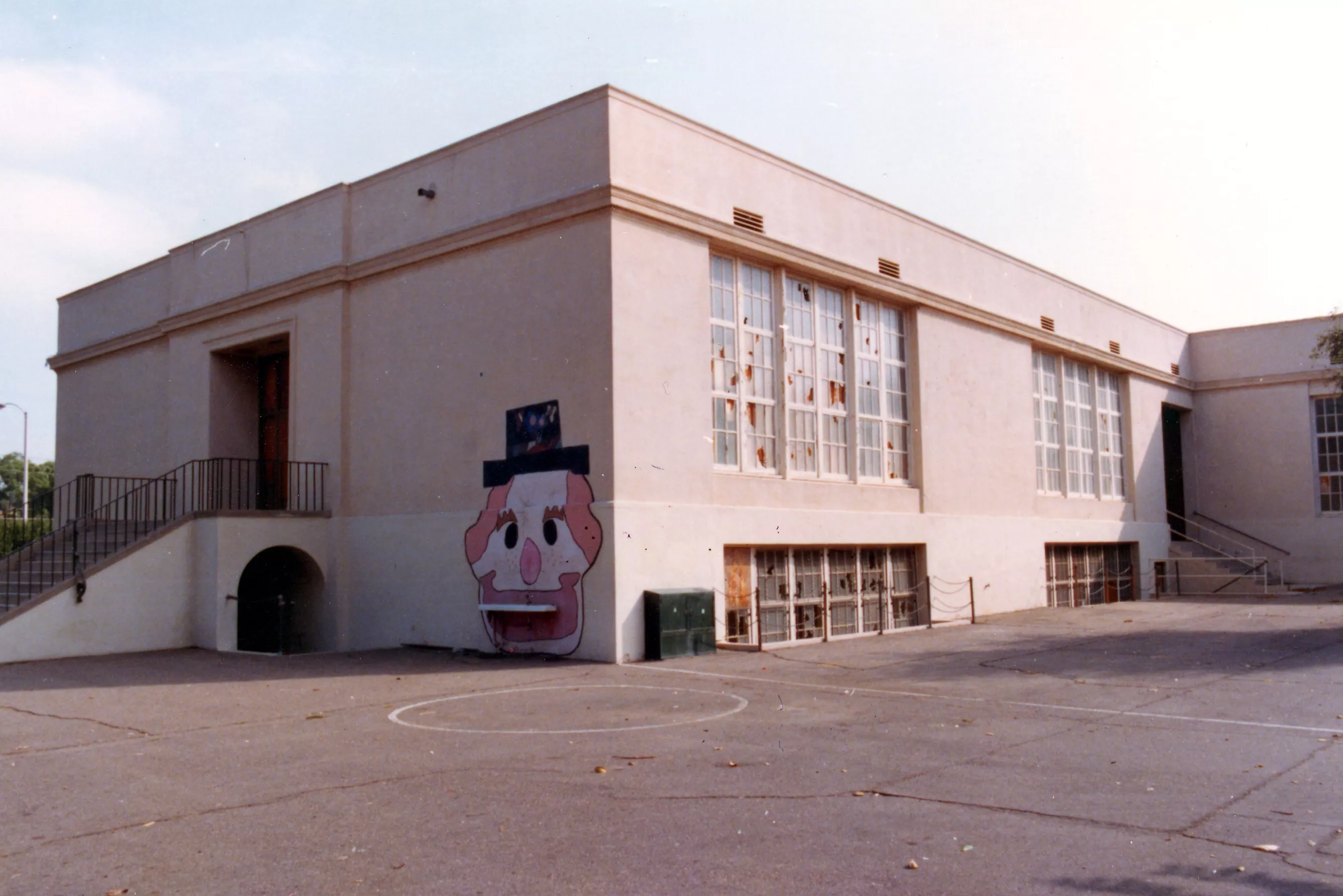 A colored photo of the Ford Elementary School&#039;s playground in 1984 before demolition.