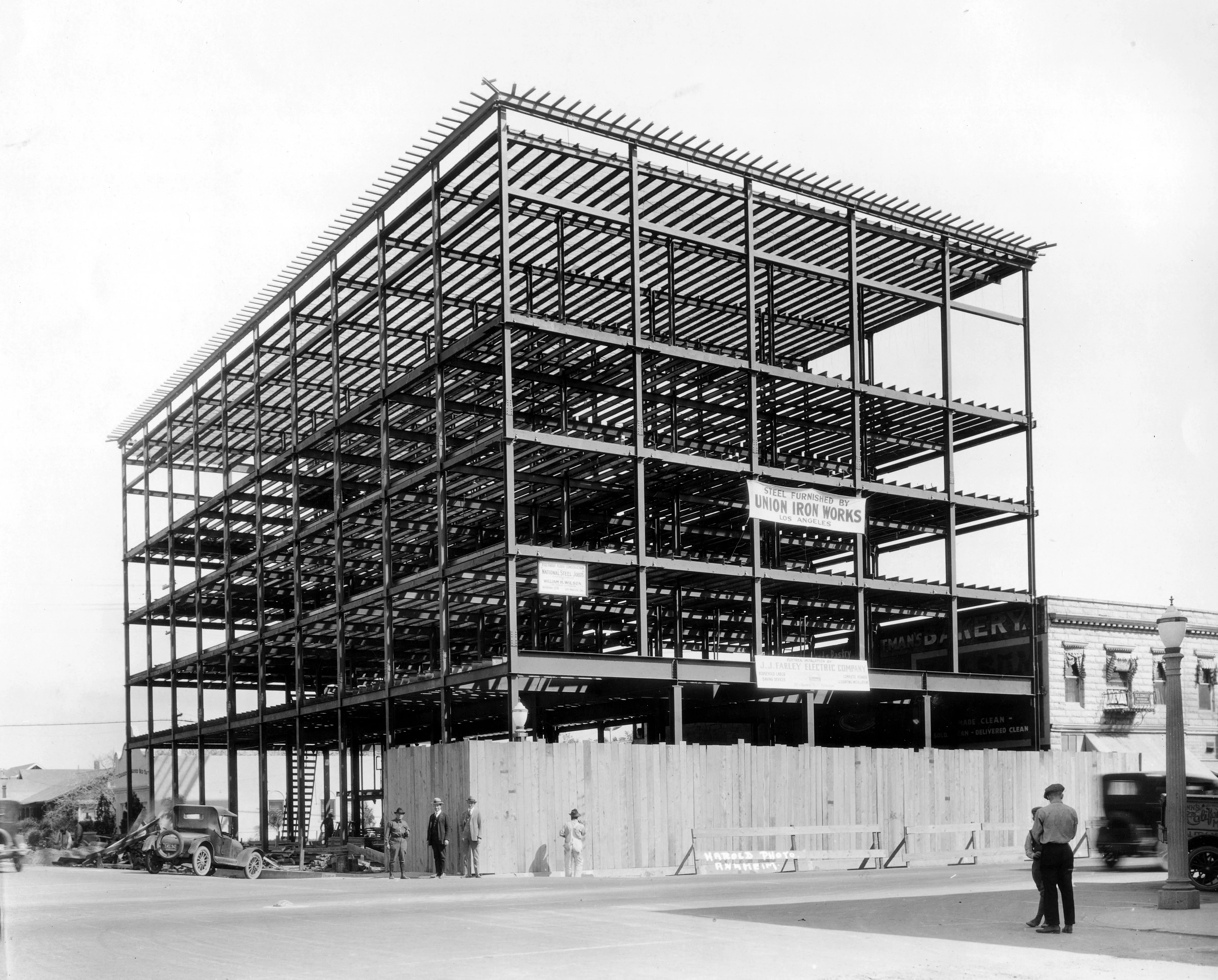 A black and white photograph of the Chapman Building under construction in 1922.