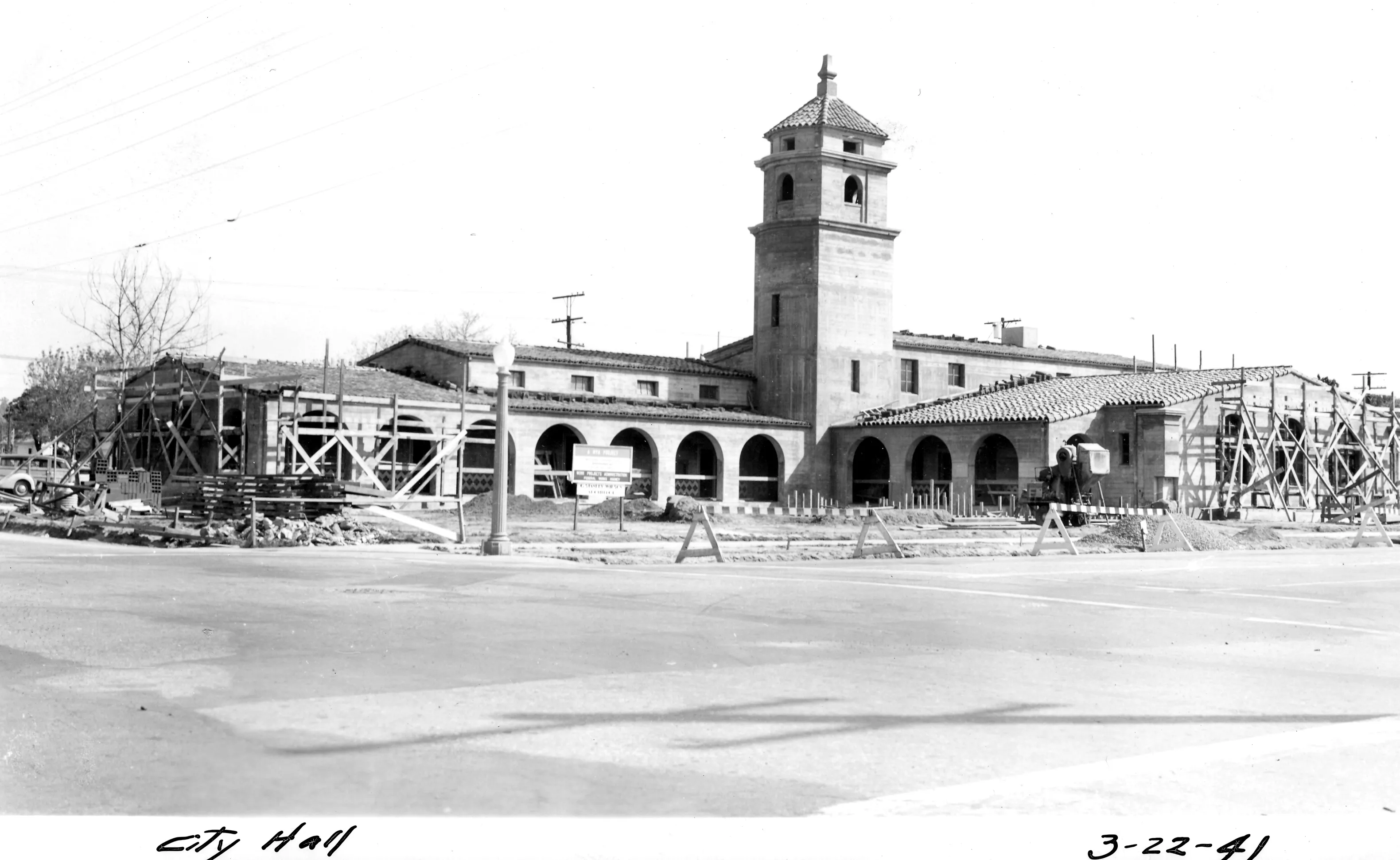 A black and white photograph of the Fullerton City Hall under construction, taken in 1941. The bottom of the photo reads: City Hall. March 22, 1941.