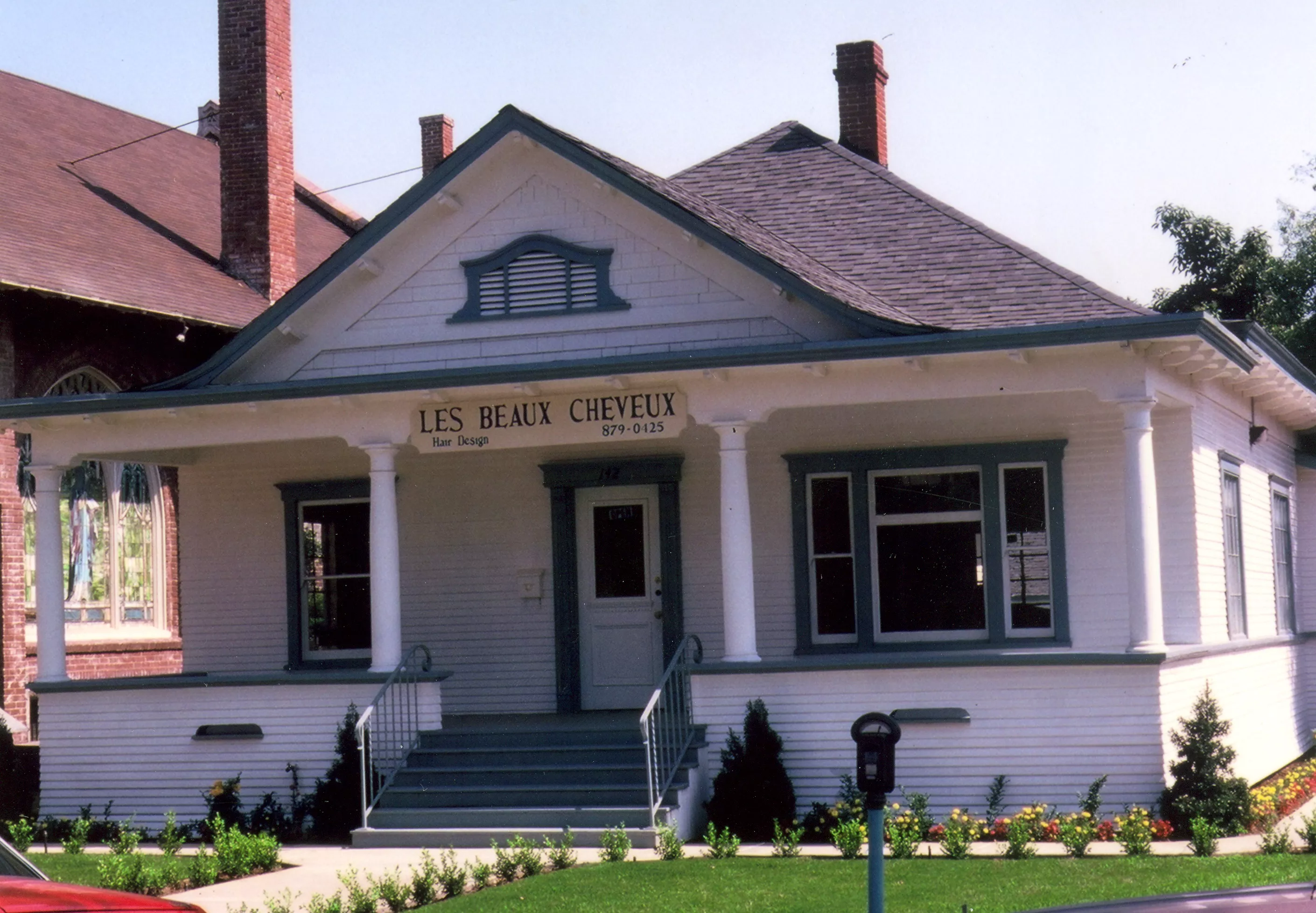 A colored photo of the Methodist Parsonage&#039;s exterior after restoration in 1985.