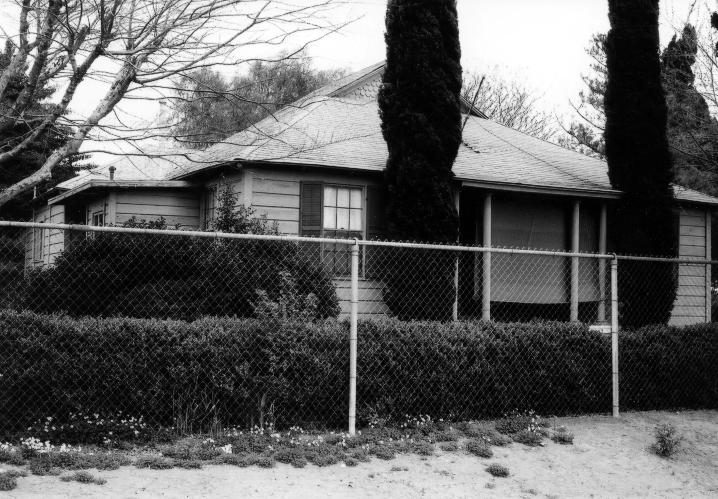 A black and white photograph of the Otto Des Granges House for the Historical Building Survey in 1978.