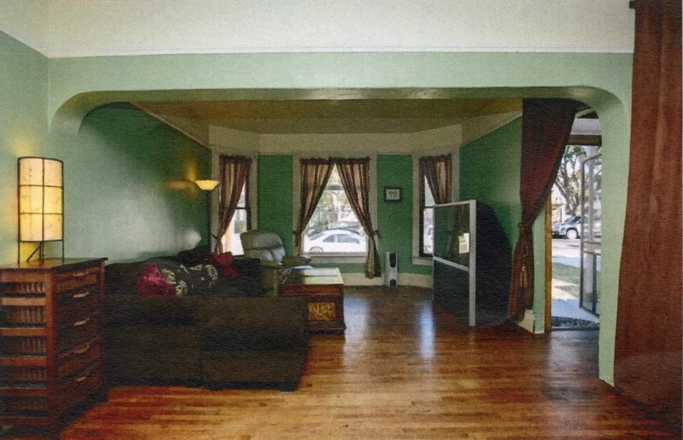 A colored photo of the interior living room of the Charles Ruddock House in 2017.