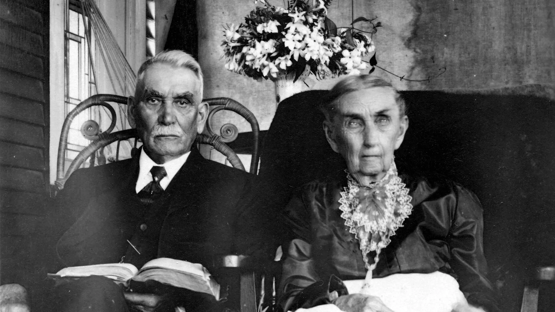 A black and white photograph of Reverend Francis Holcomb and his wife.