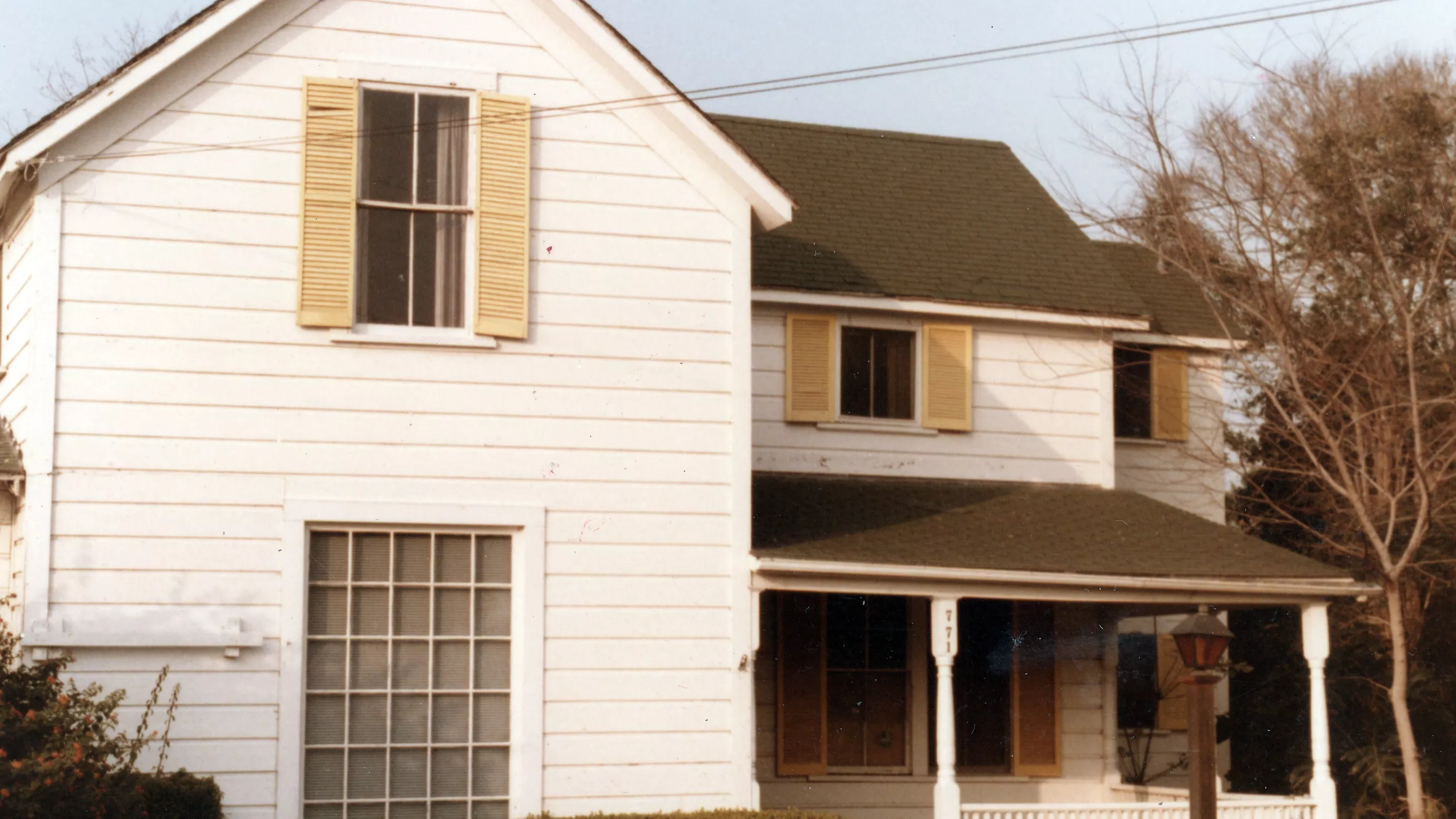 A colored photo of the exterior of the John Kerr House in 1984.