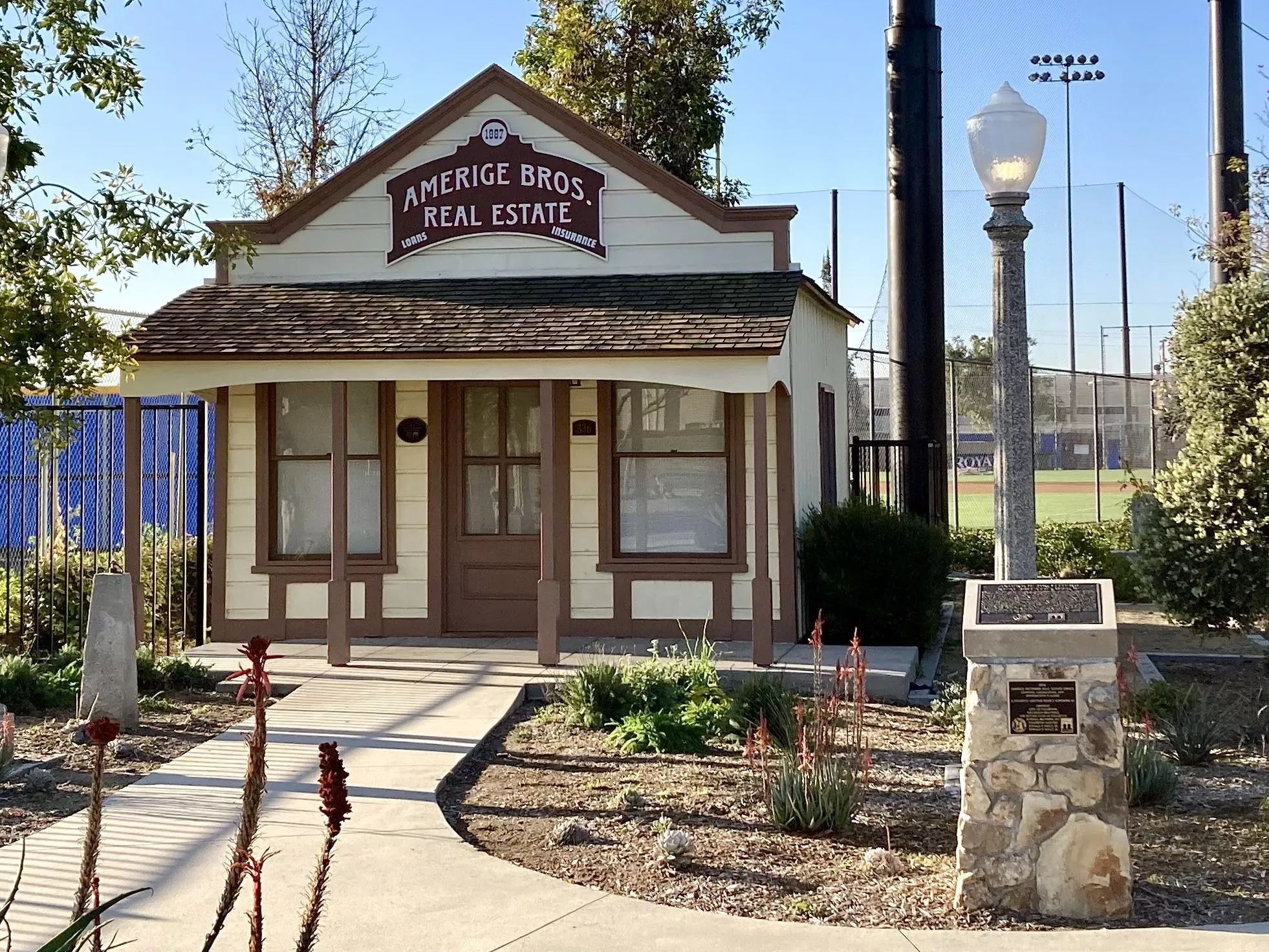 A colored photo of the Amerige Brothers Real Estate Office in Amerige Park in 2013 after being refurbished.