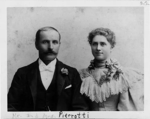 A black and white photograph of Attilio and Jane Pierotti in 1895. The handwriting at the bottom of the photograph reads: Mr. and Mrs. Pierrotti.