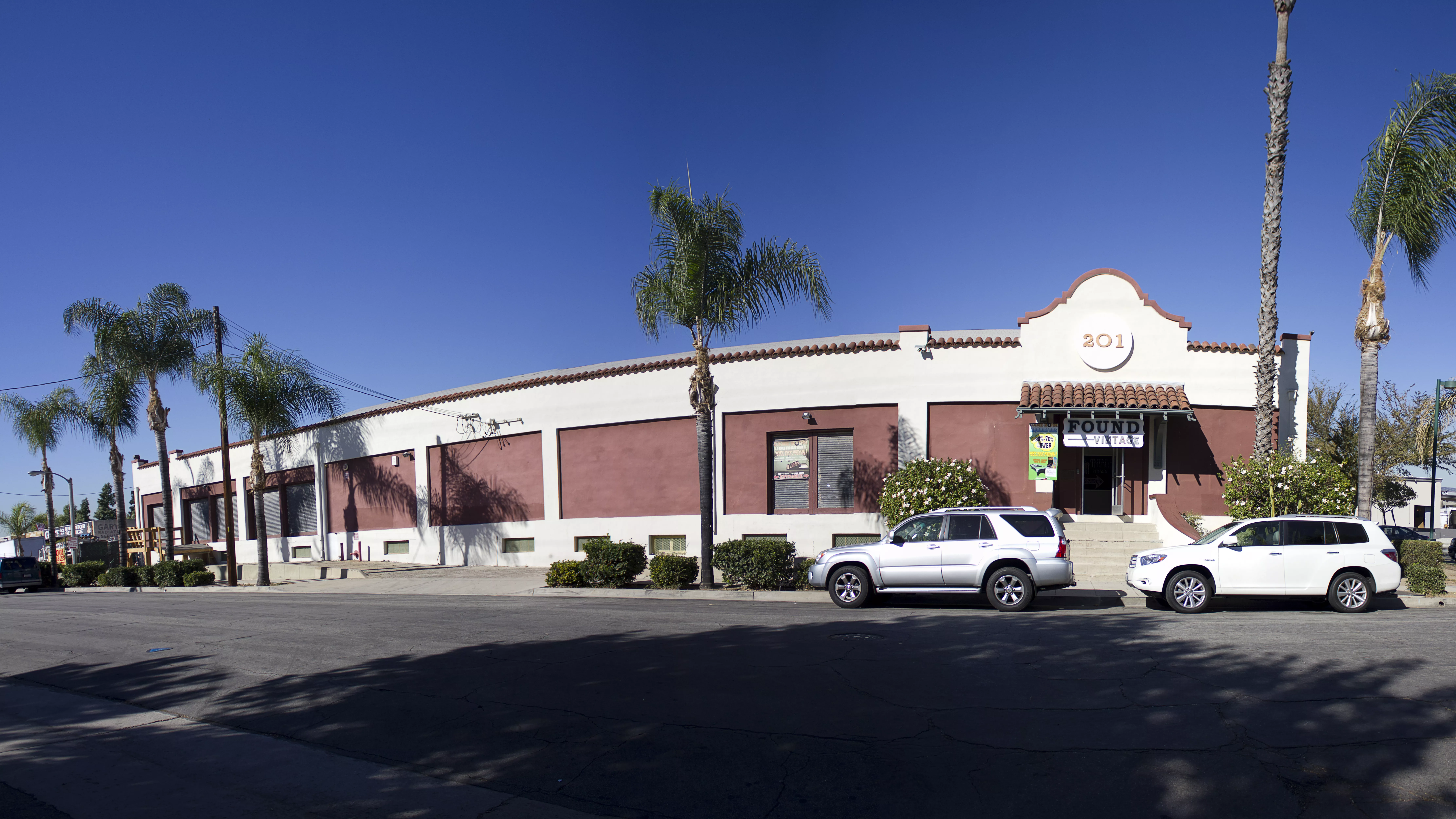 A colored panoramic photo of the exterior of the Elephant Packing House in 2012.