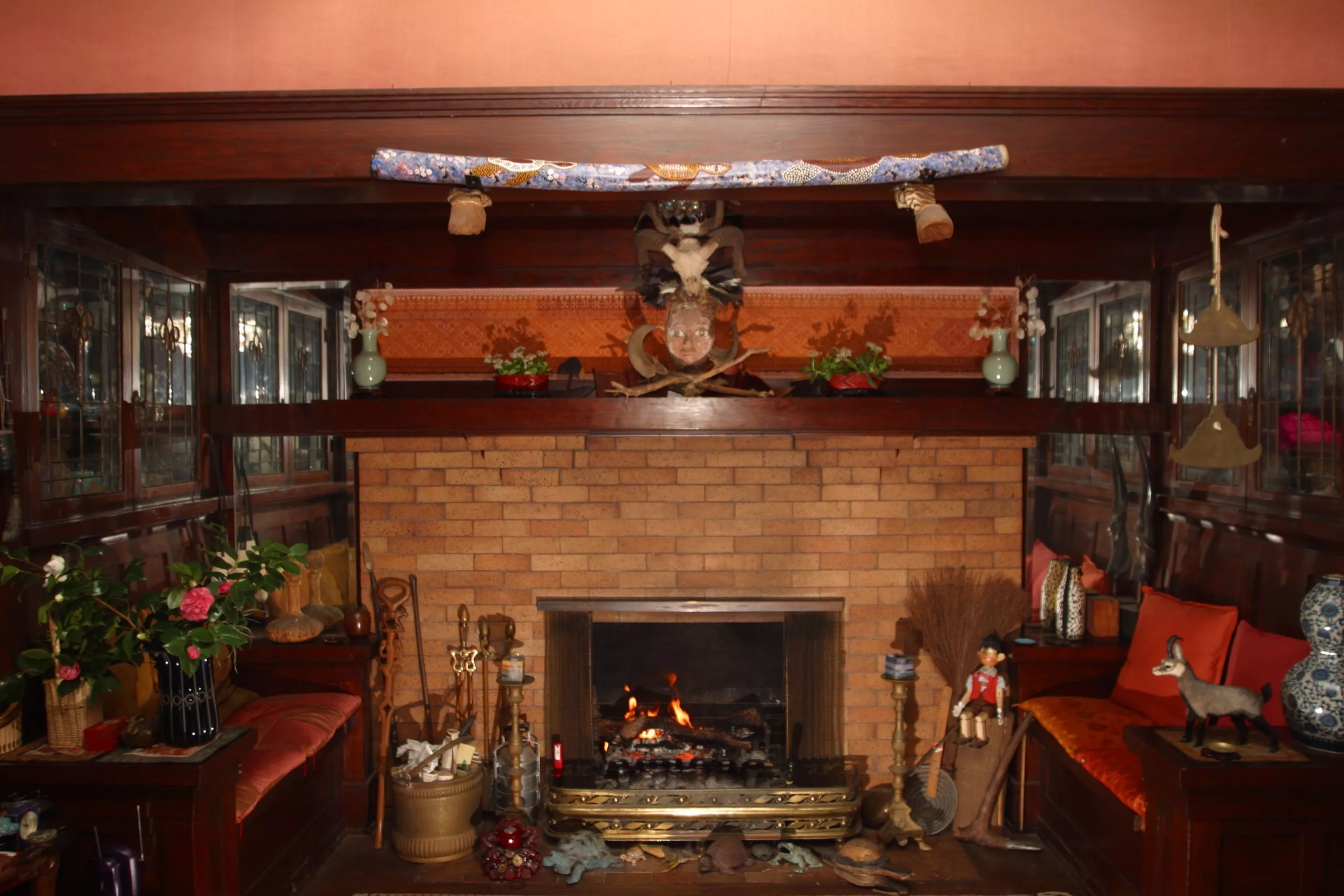 A colored photo of the fireplace at the Pierotti House &amp; Gardens in 2006.