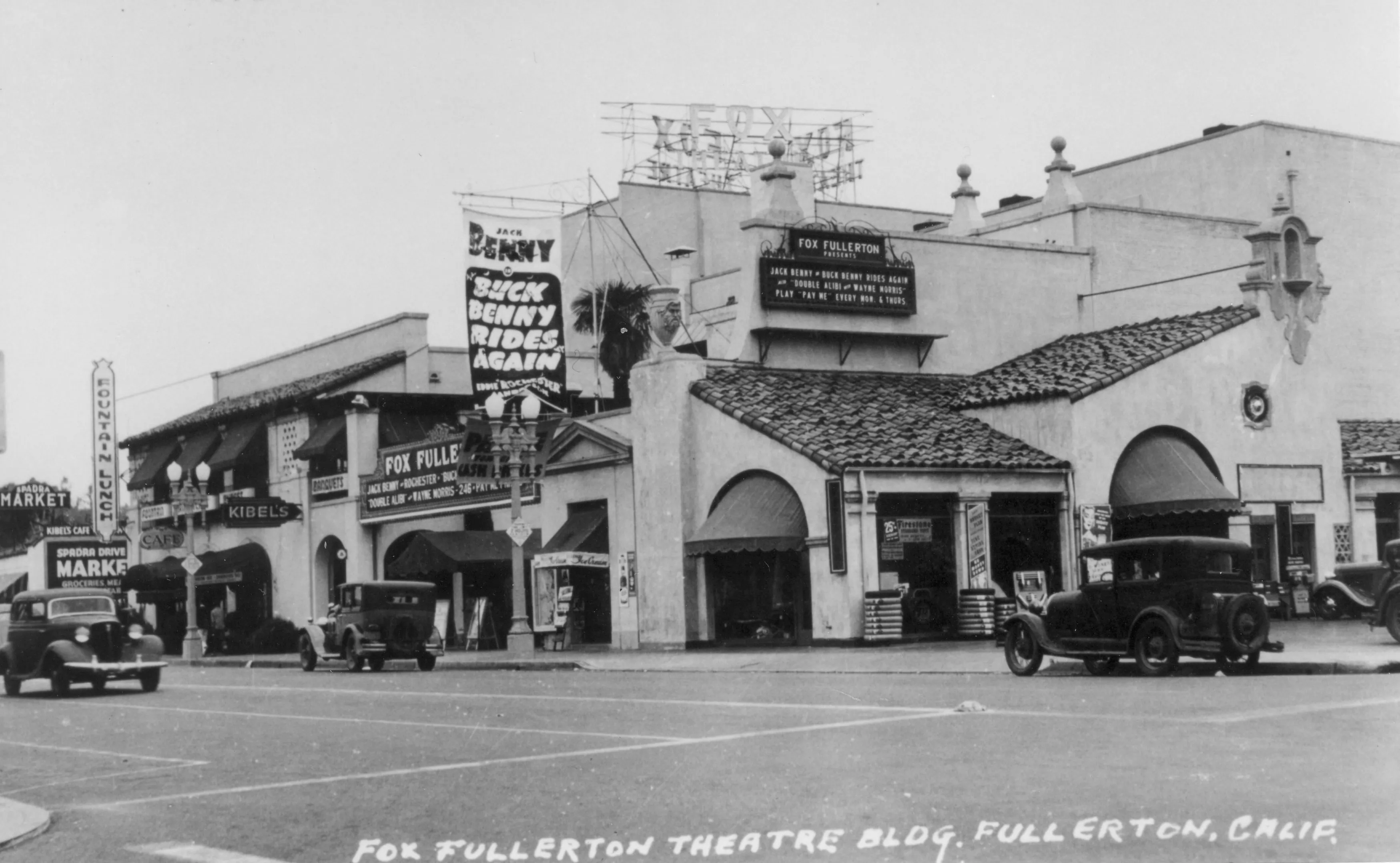 A black and white photograph of the Fox Fullerton Theatre in 1940. The bottom of the photo reads: Fox Fullerton Theatre Building. Fullerton, California.