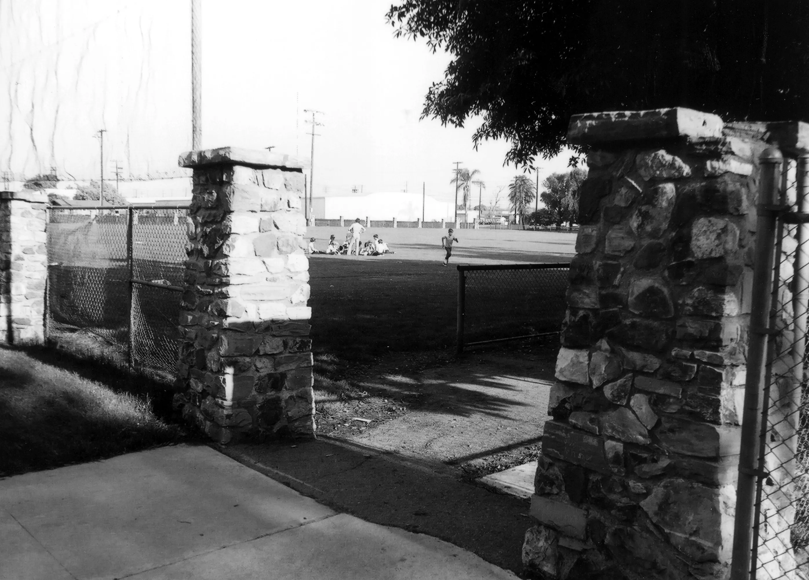 A black and white photograph of the stone pilasters at Amerige Park in 1978 for the Historical Building Survey.