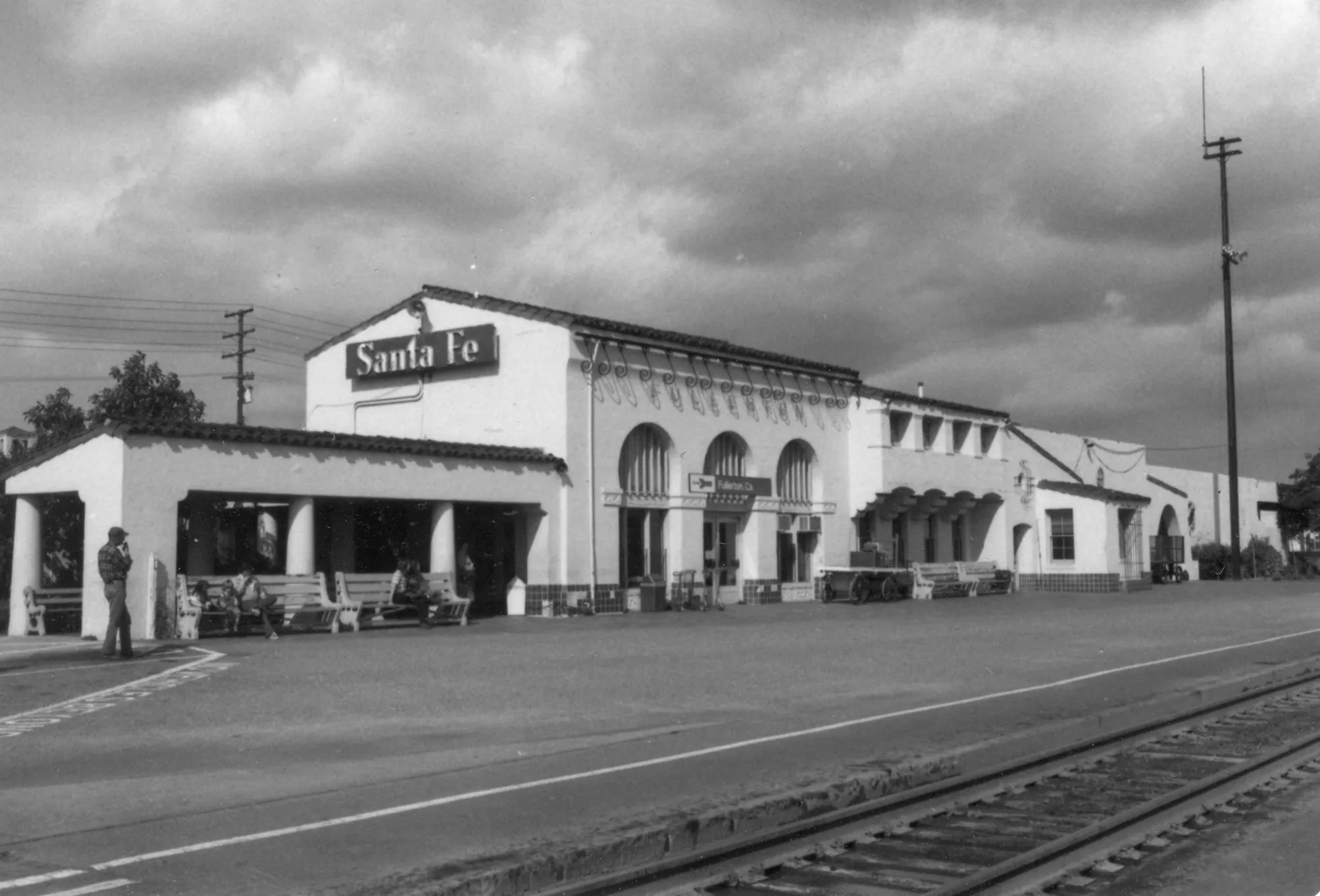 A black and white photograph of the Santa Fe Railway Passenger &amp; Freight Depot for the Historical Building Survey in 1978.
