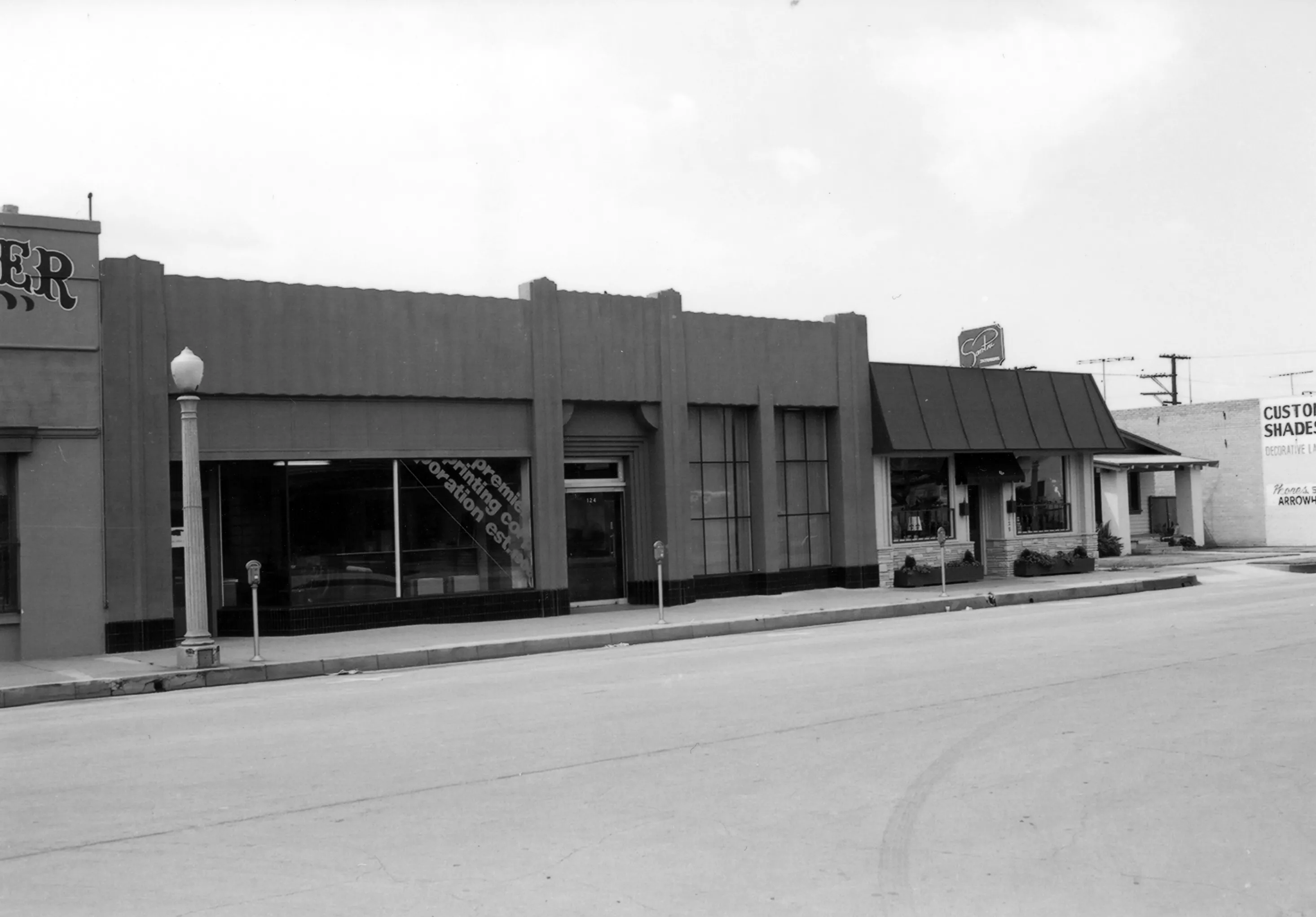A black and white photograph of the Fullerton Building &amp; Loan Association for the Historical Building Survey in 1978.