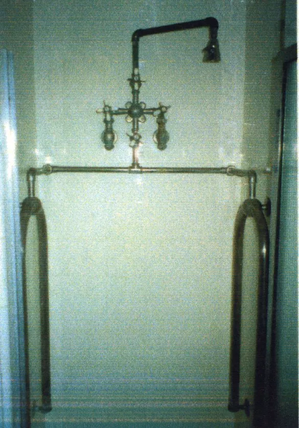 A colored photo of the interior bathroom of the John Hetebrink House in 1997.