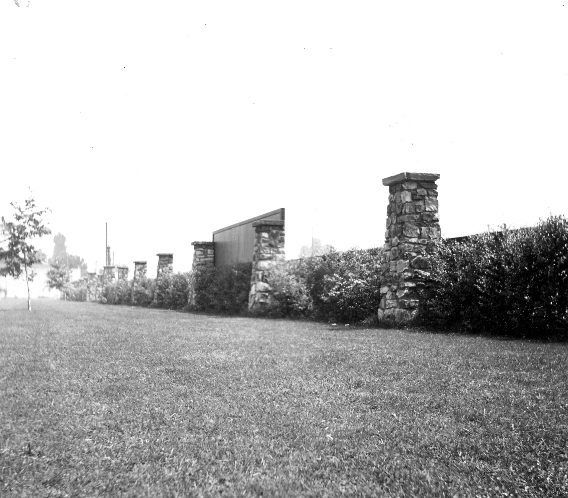 A black and white photograph of the stone pilasters at Commonwealth (now Amerige) Park in 1938.