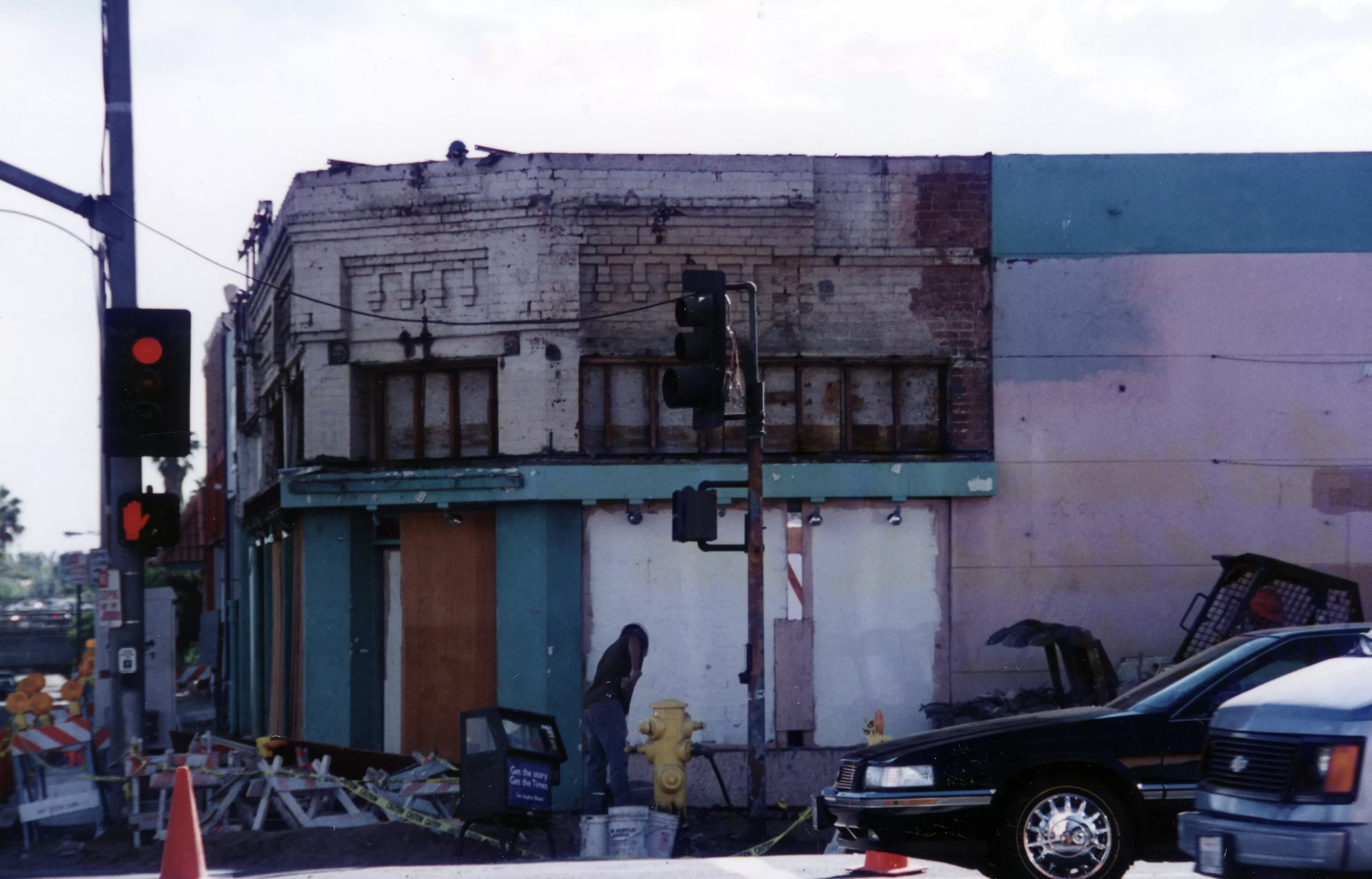 A colored photo of the rehabilitation of the Farmers and Merchants Bank in 1989.
