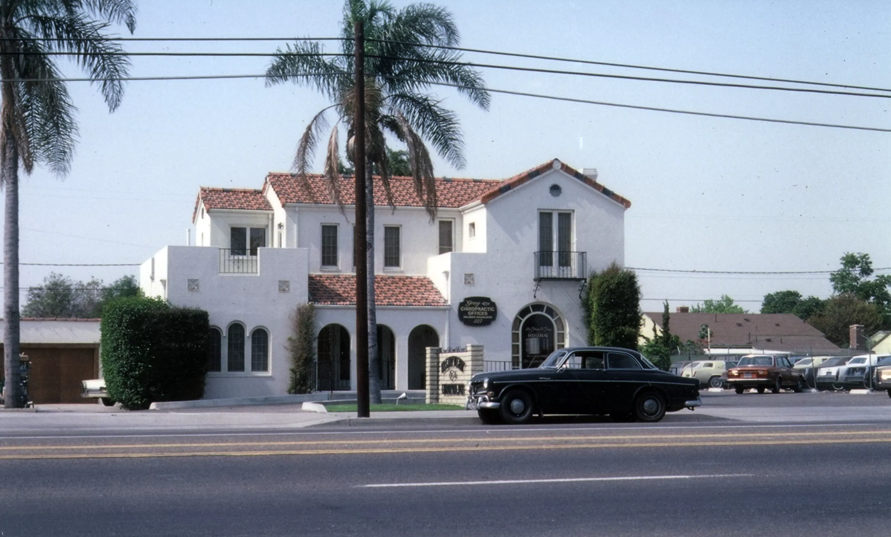 A colored photo of the street view for the William Wintter House in 1979.