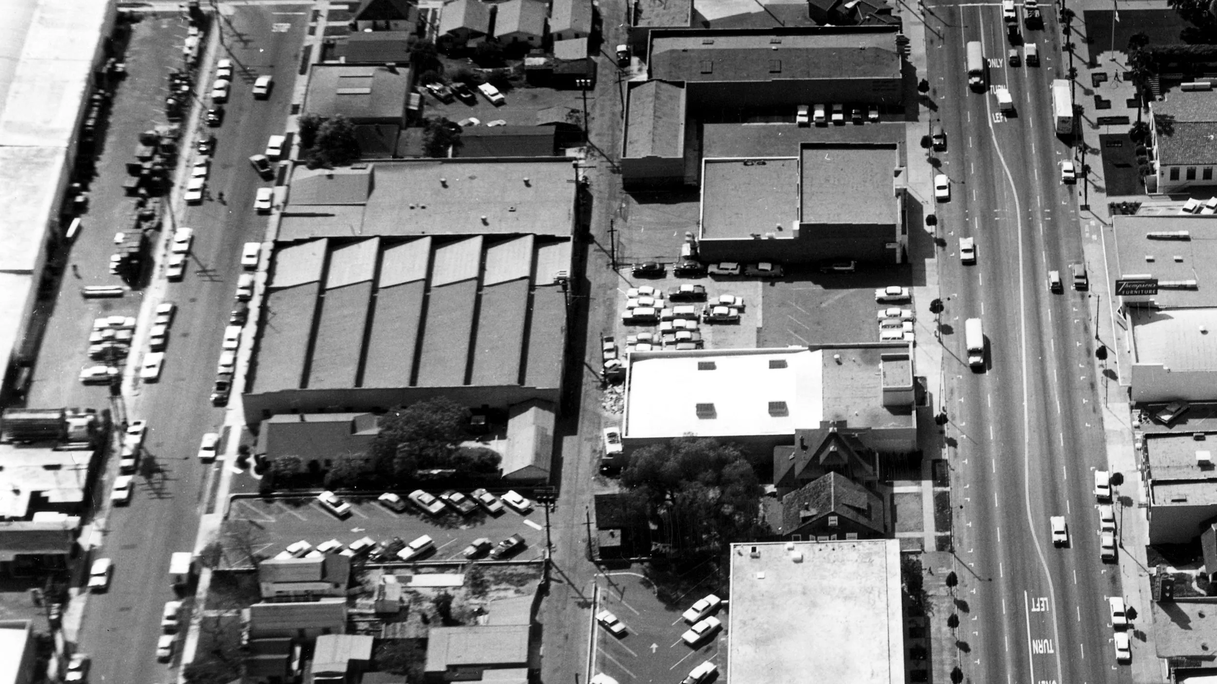 A black and white photograph of the aerial view above the Sanitary Laundry Building and Fullerton Dye Works building in 1963.
