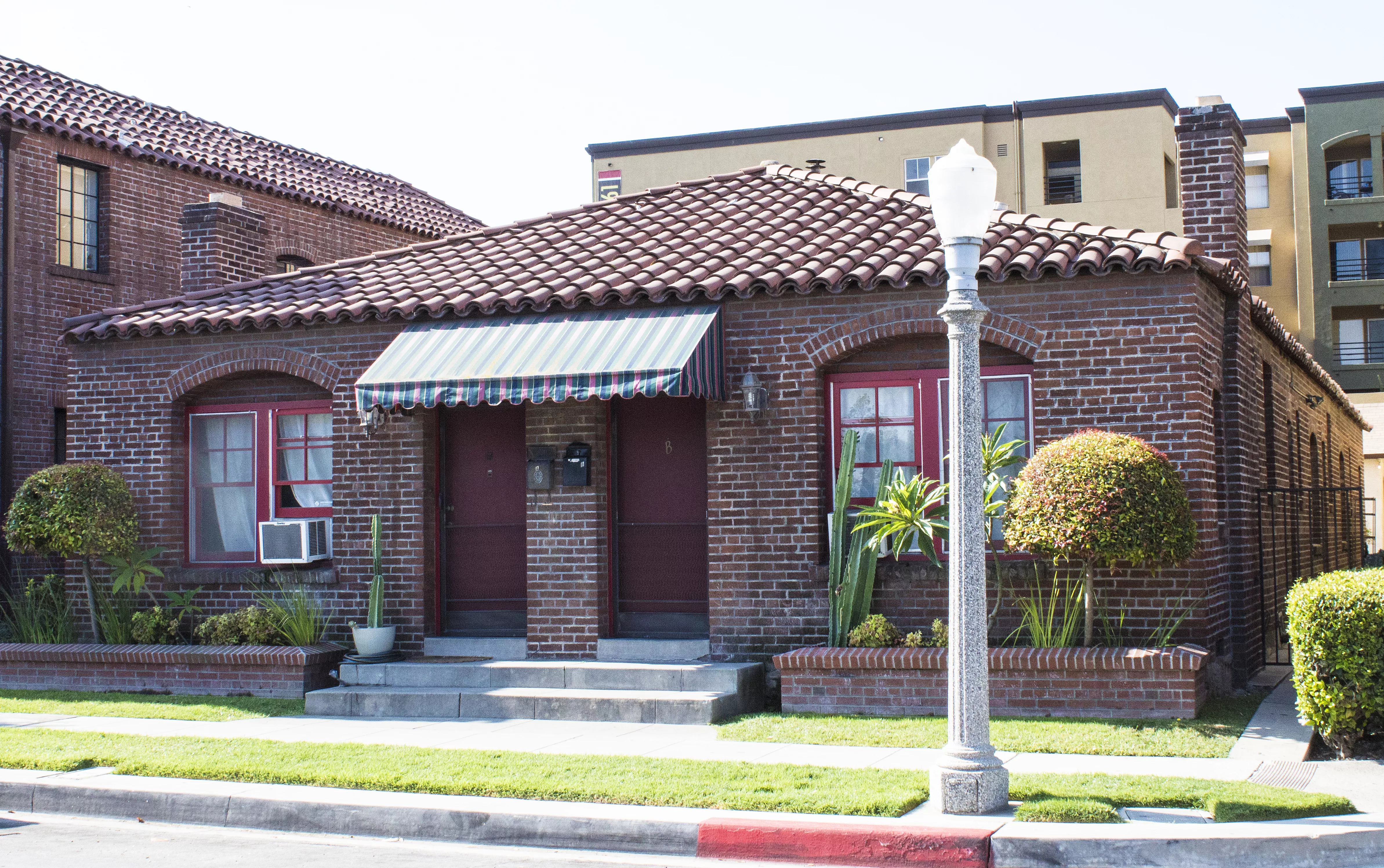 A colored photo of the Samuel Dunphy Fourplex (now Westwood Apartments) in 2017.