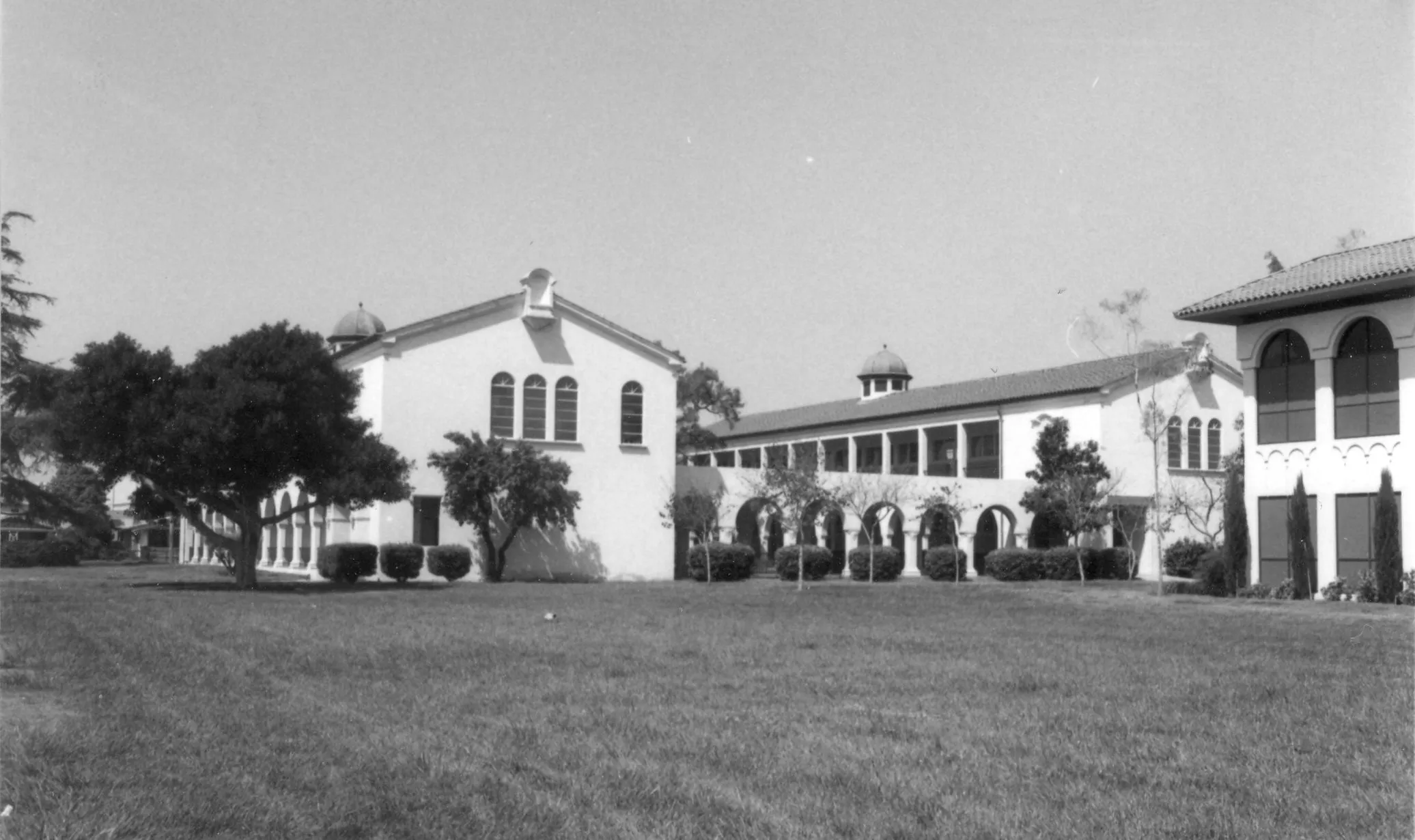 A black and white photograph of the east side exterior of the FUHS Science Building 1 and 2.