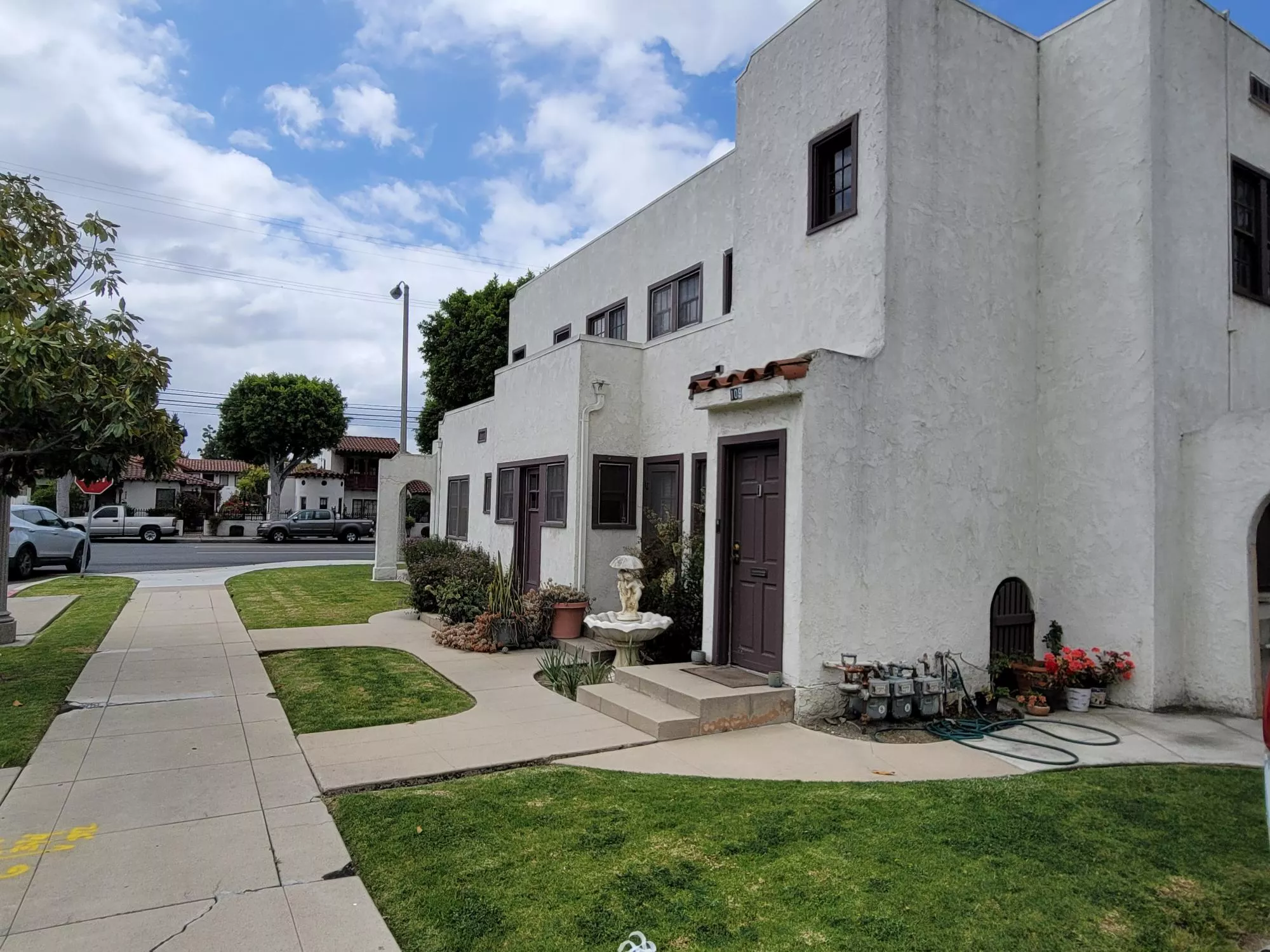 A colored photo of the east side of the Jesse Ellis Apartments complex in 2025.