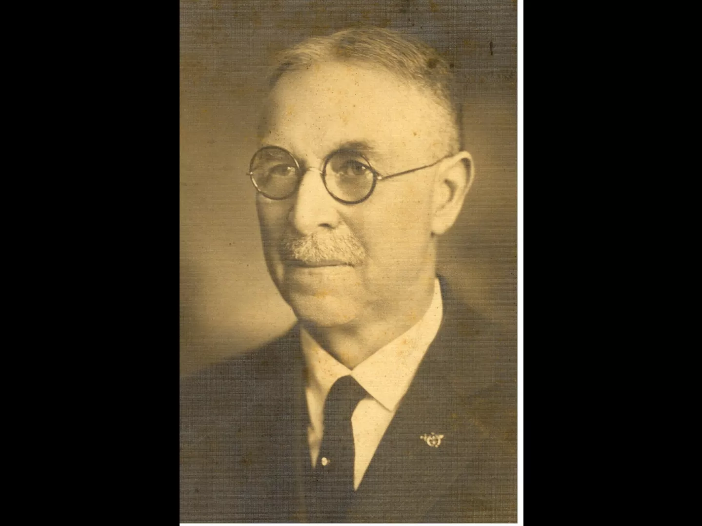 A vintage portrait photograph of Edgar Johnson.