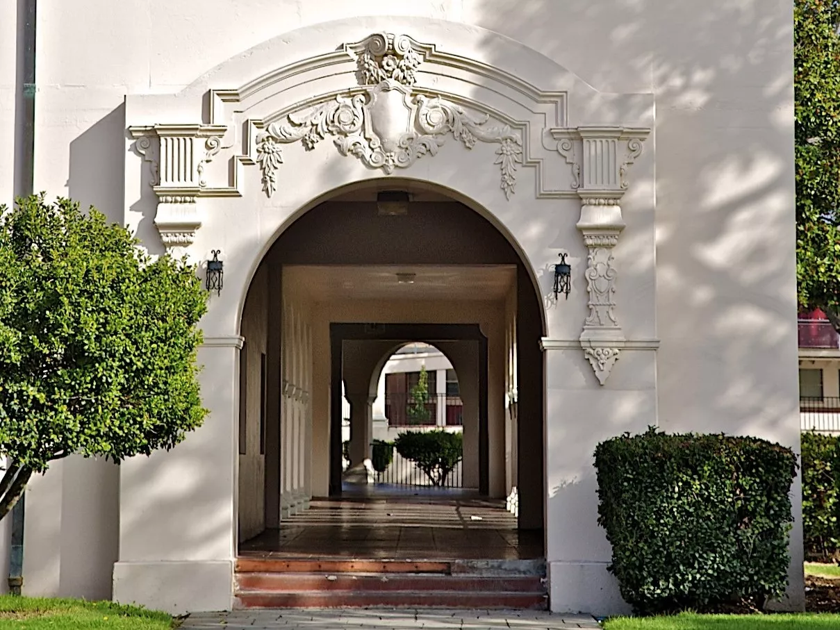 A colored photo of the entry arch detail of the FUHS Science Buildings in 2009.