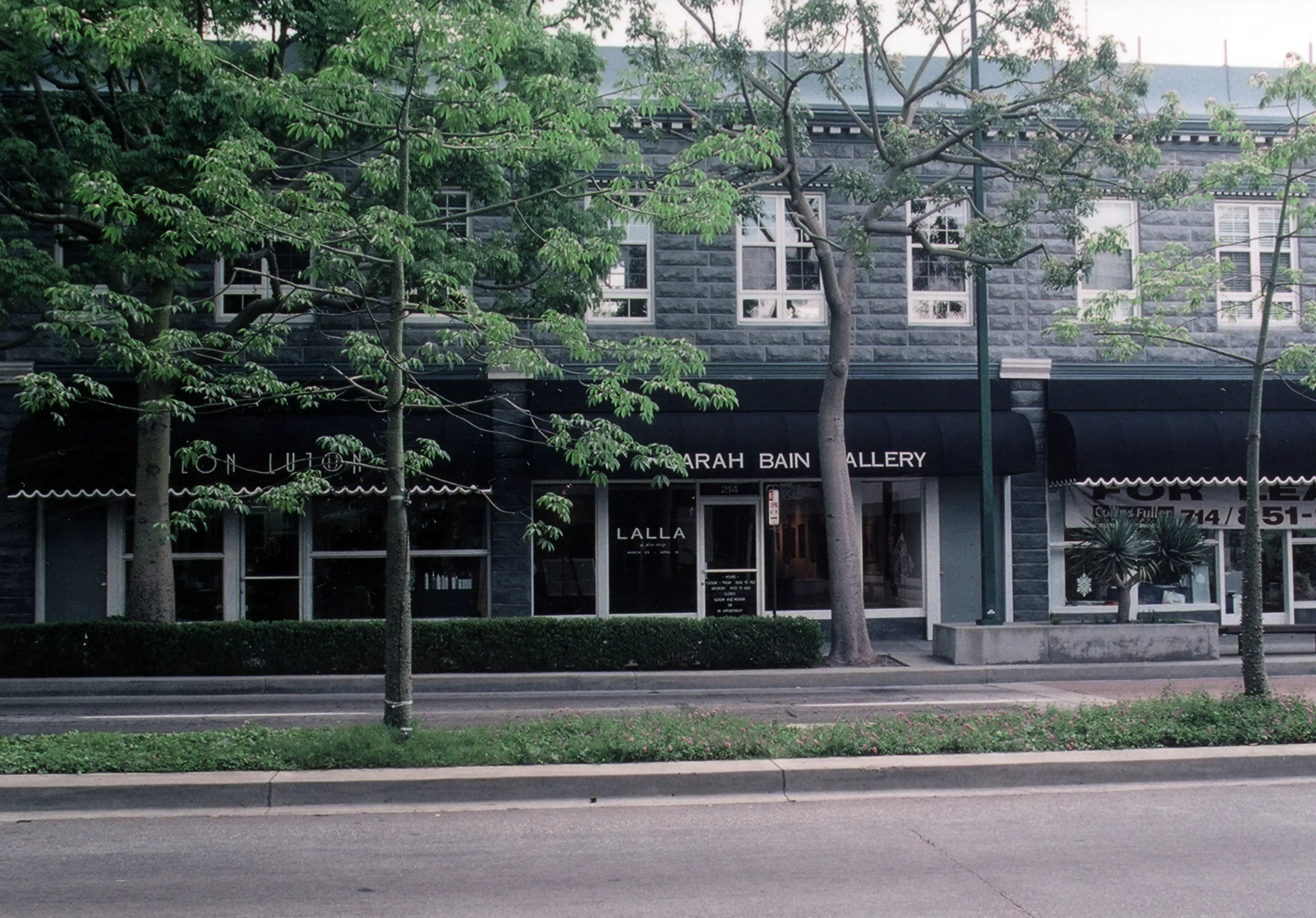 A colored photo of the exterior of the Peter Schumacher Building in 2006.