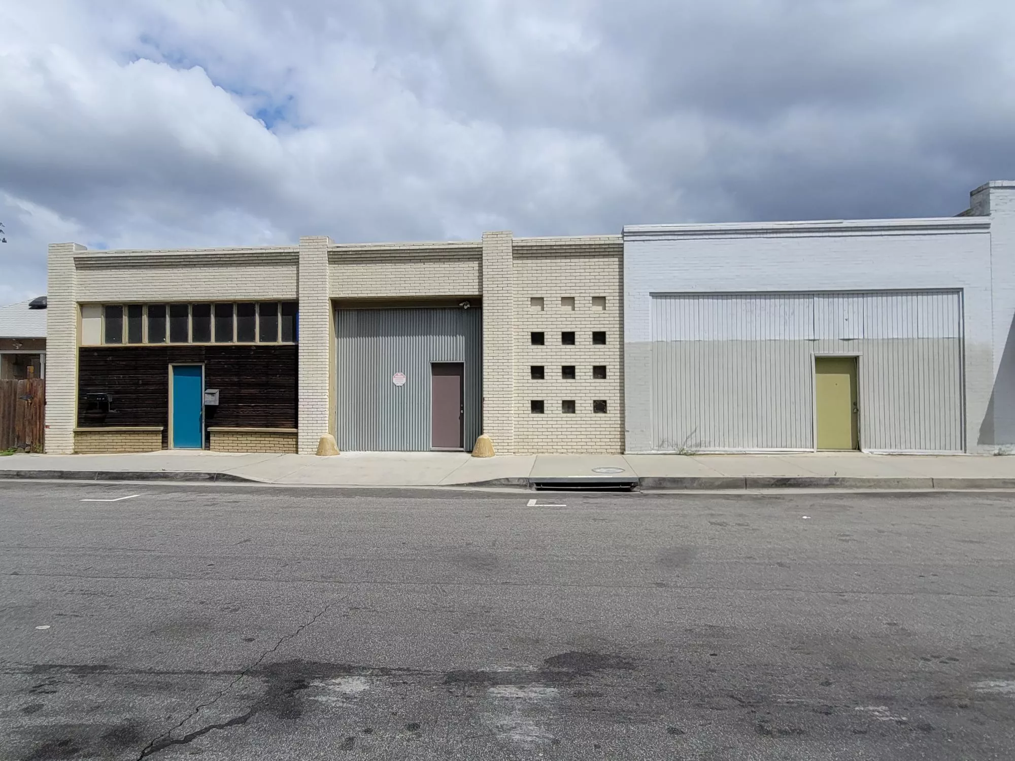 A colored photo of the exterior of the Fullerton Dye Works building in 2025.