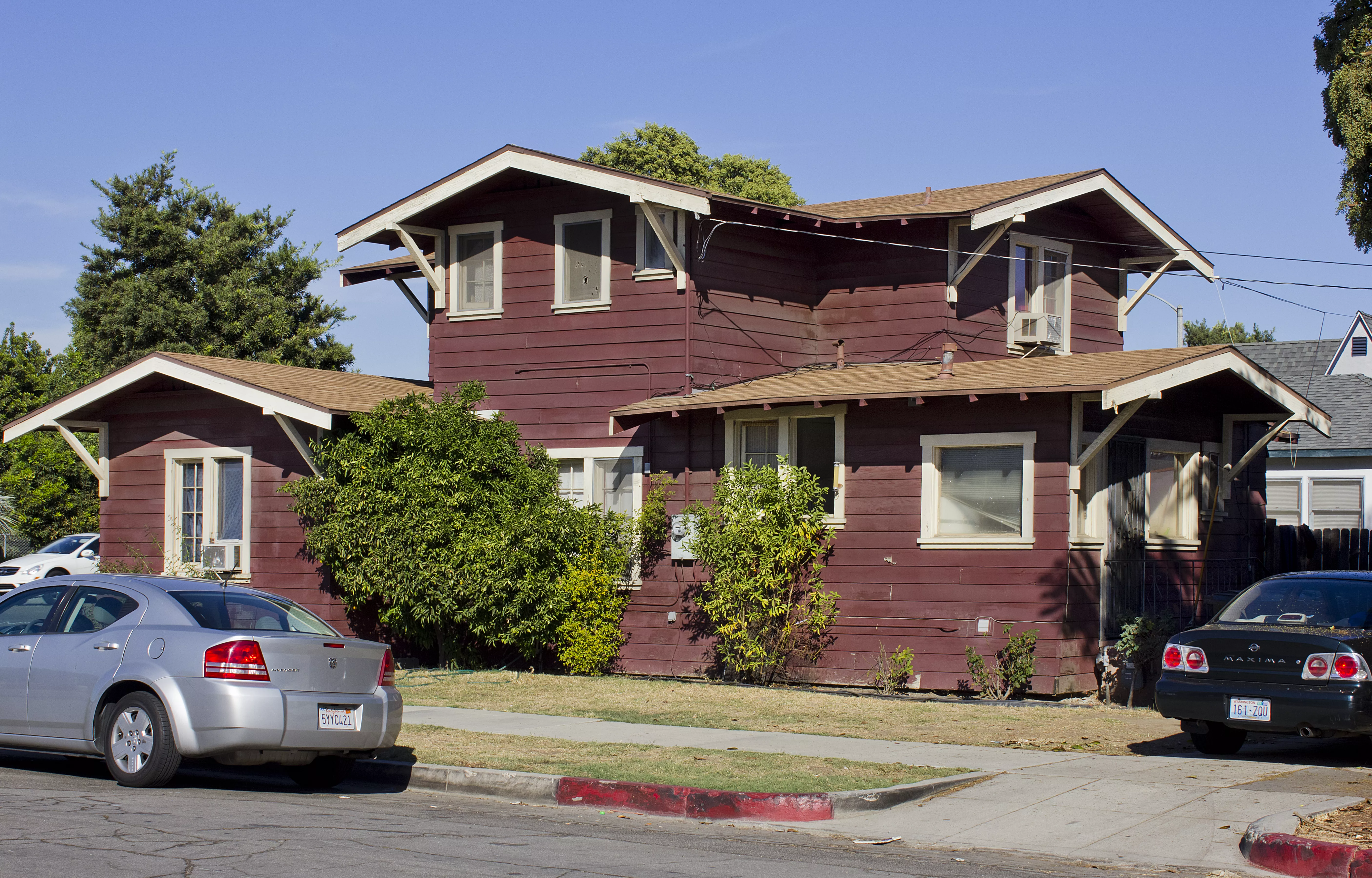A colored photo of the exterior of the west side of the Albert Stuelke House in 2012.