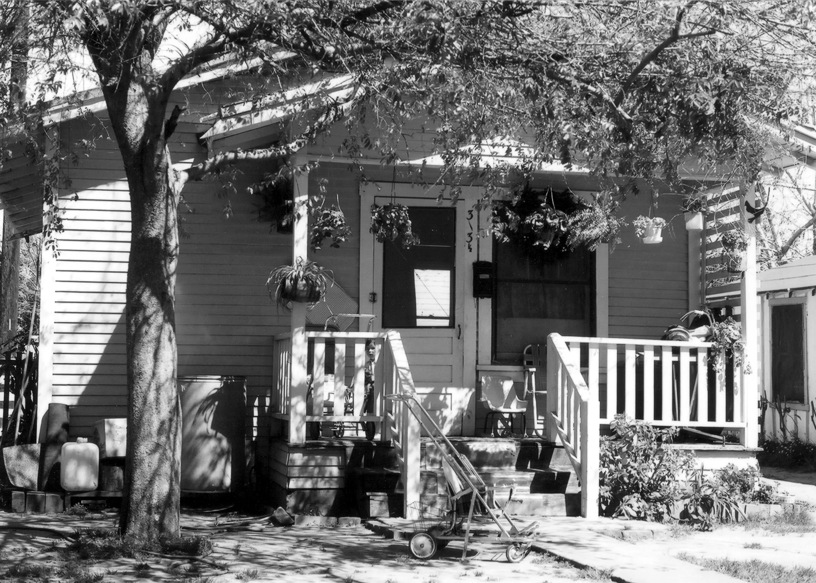 A black and white photograph of the rear of the Wilshire Brothers/Cusick House in 1978.