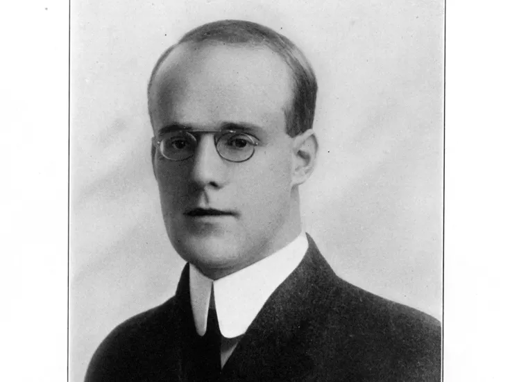 A black and white portrait photograph of Thomas Eadington Sr. in 1921. The bottom of the photo is signed T. Eadington.