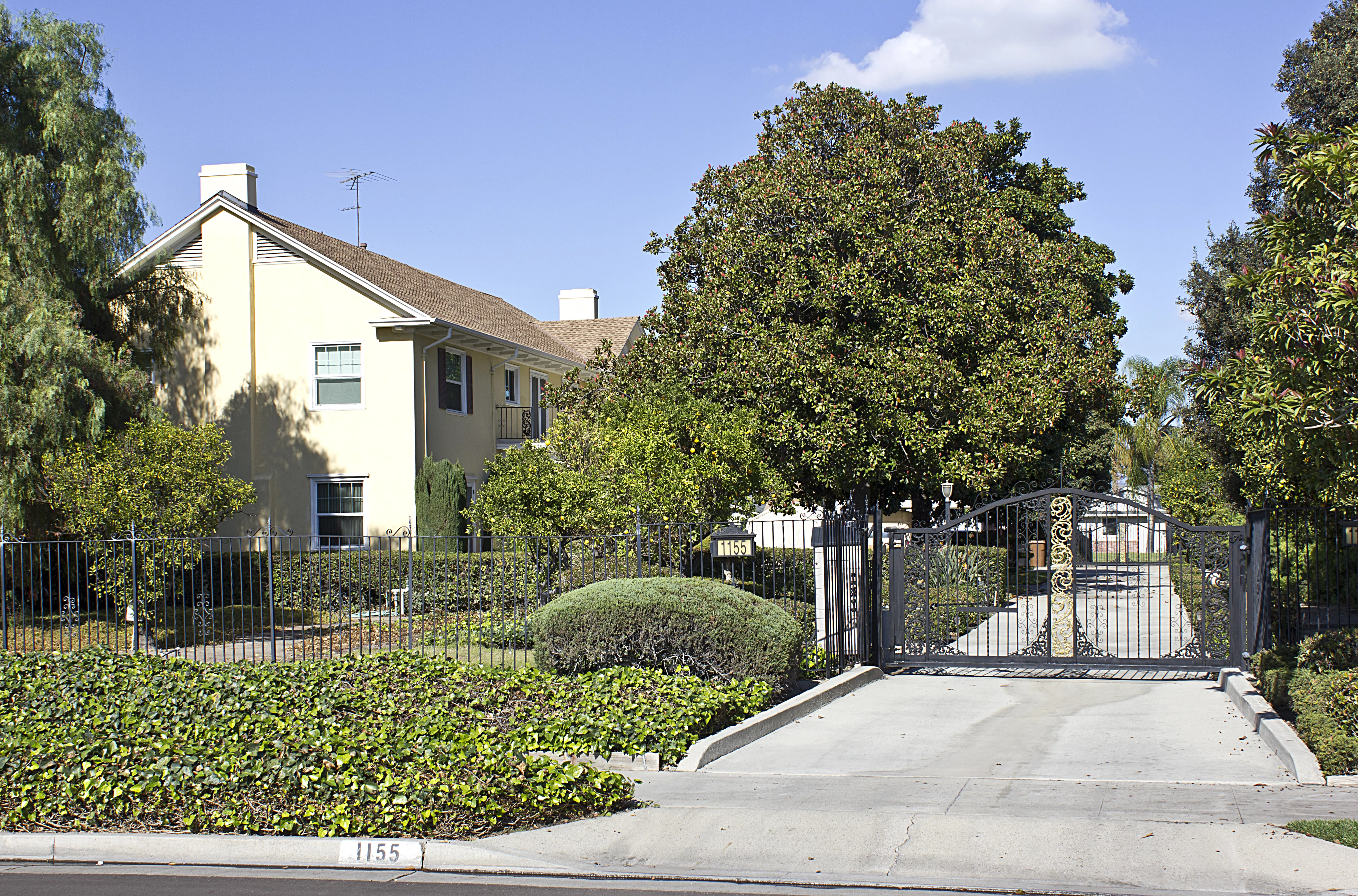 A colored photo of the view of the Lilburn Gardiner House from Orangethorpe Avenue in 2012.