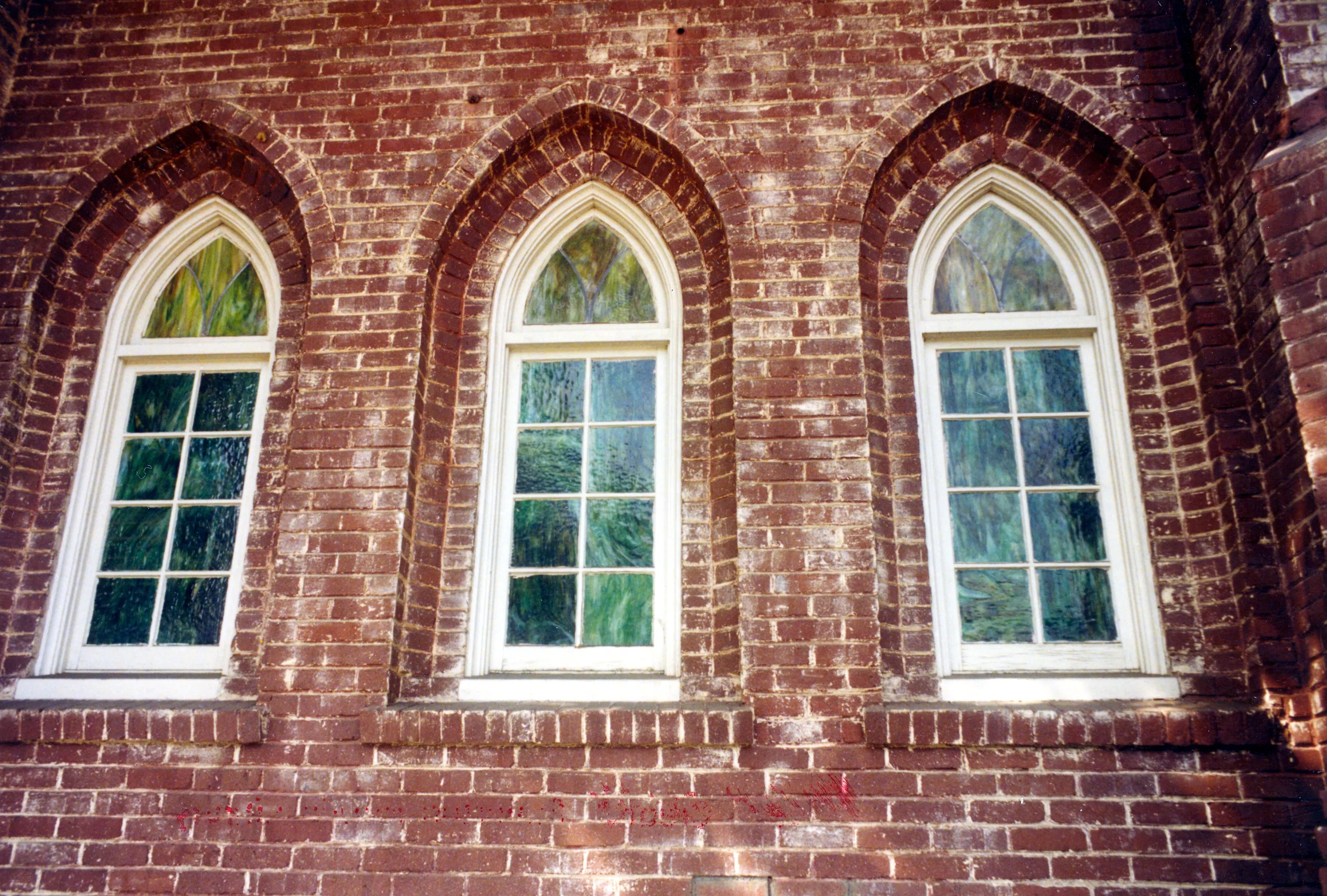 A colored photo of the window detail for the Fullerton First Methodist Episcopal Church.