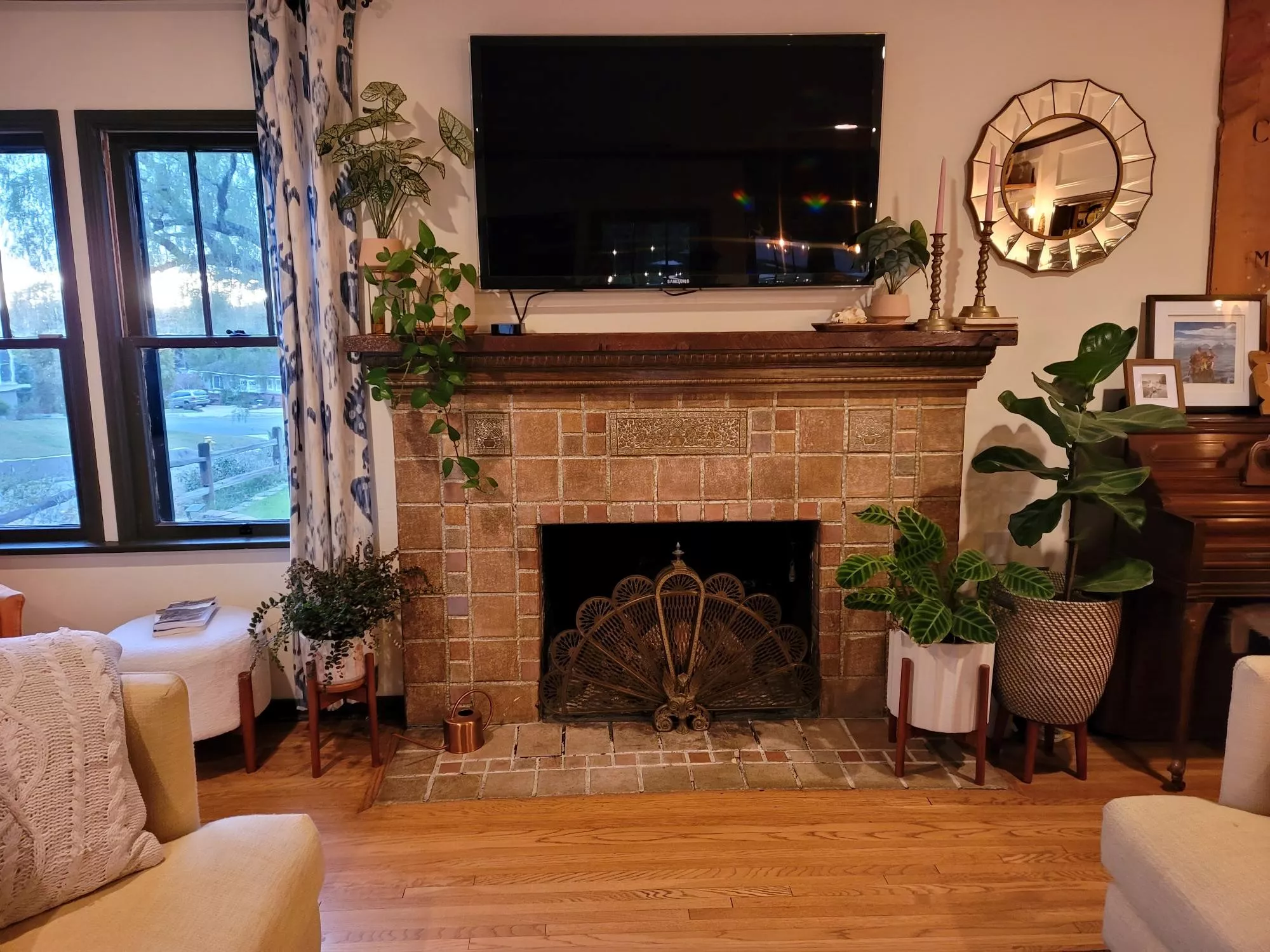 A colored photo of the Batchelder Fireplace inside the Carrie Earl McFadden Ford House in 2025.