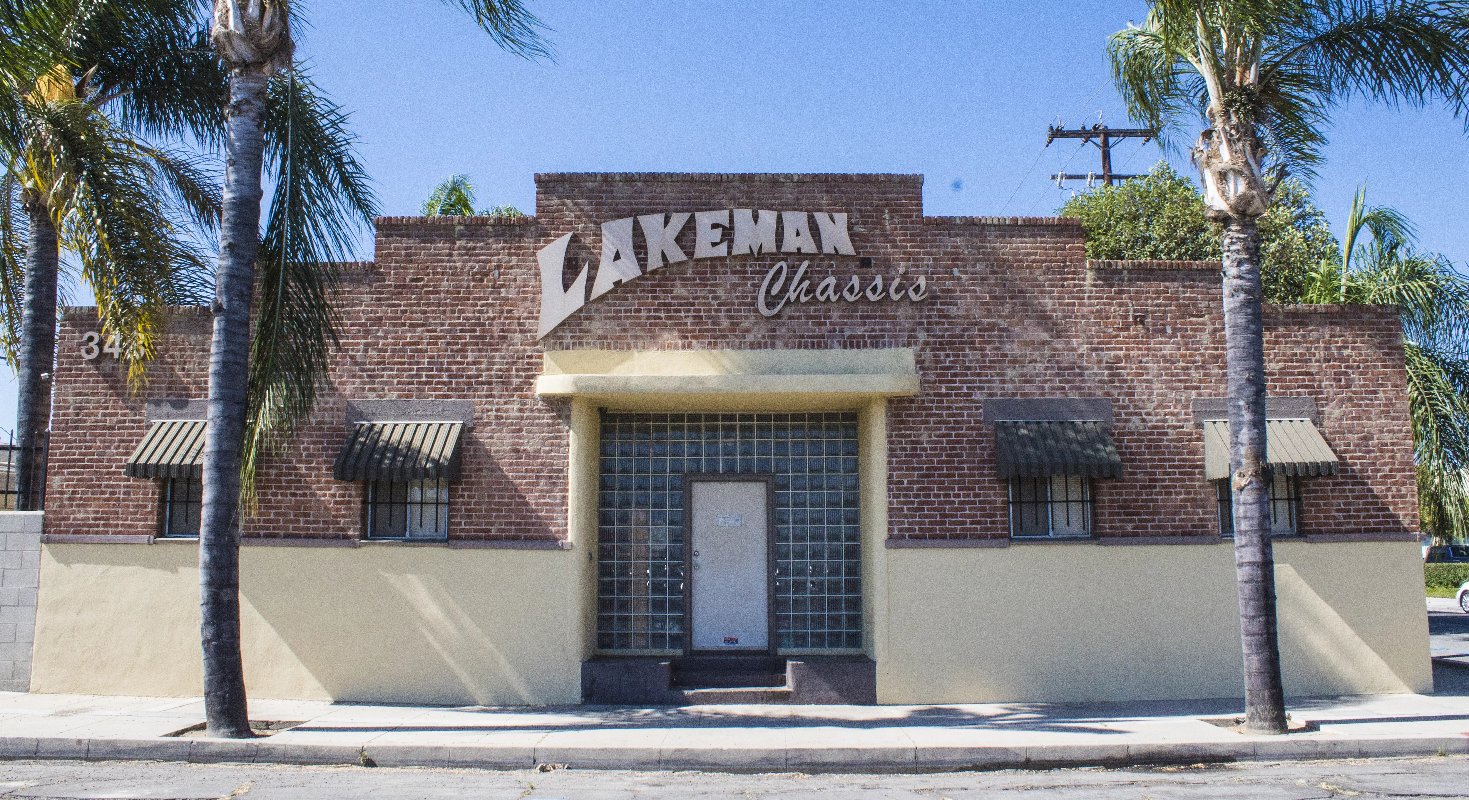 A colored photo of the Miller Manufacturing Building (now Lakeman Chassis) in 2017.
