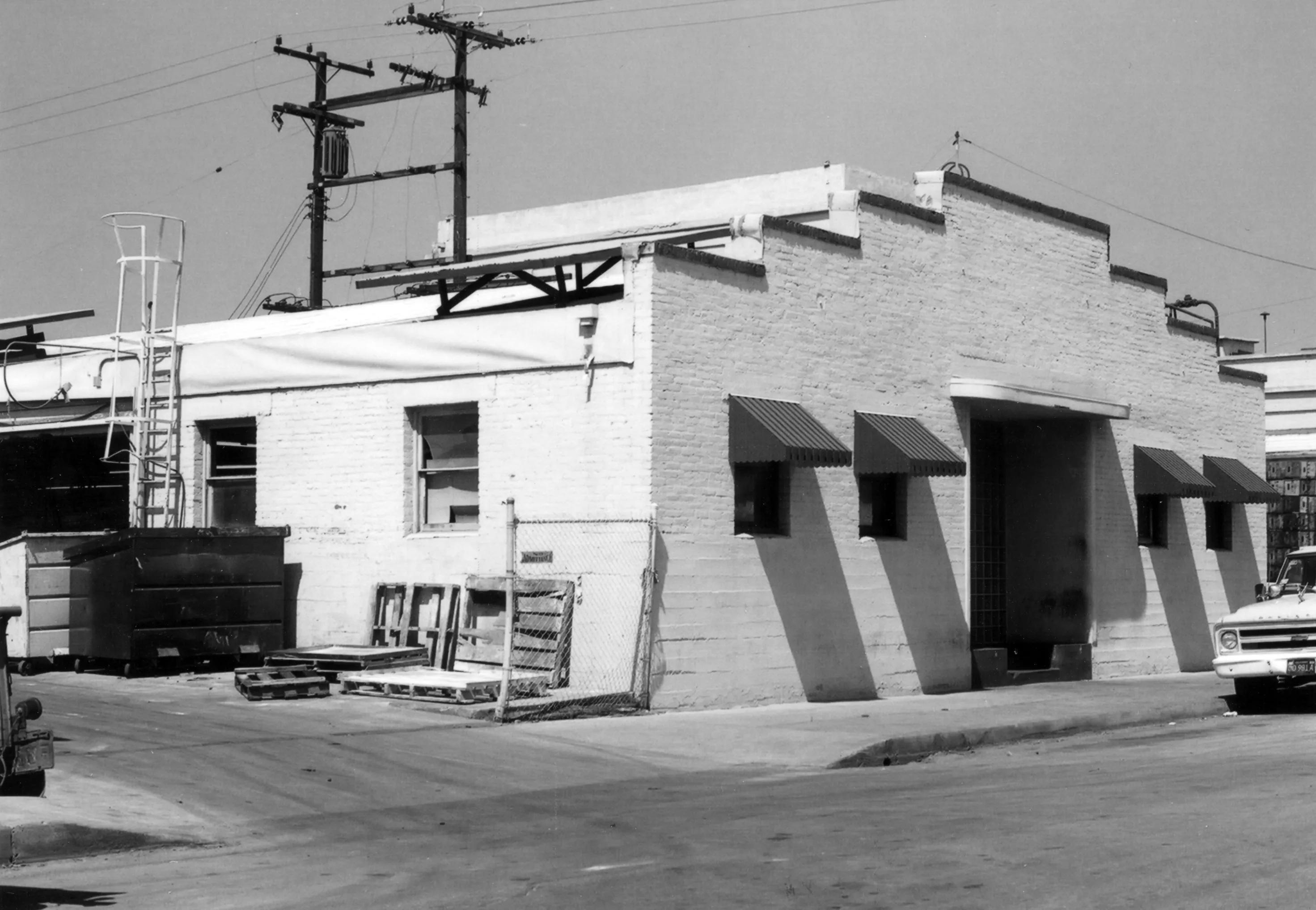 A black and white photograph of the Miller Manufacturing Building for the Historical Building Survey in 1978.