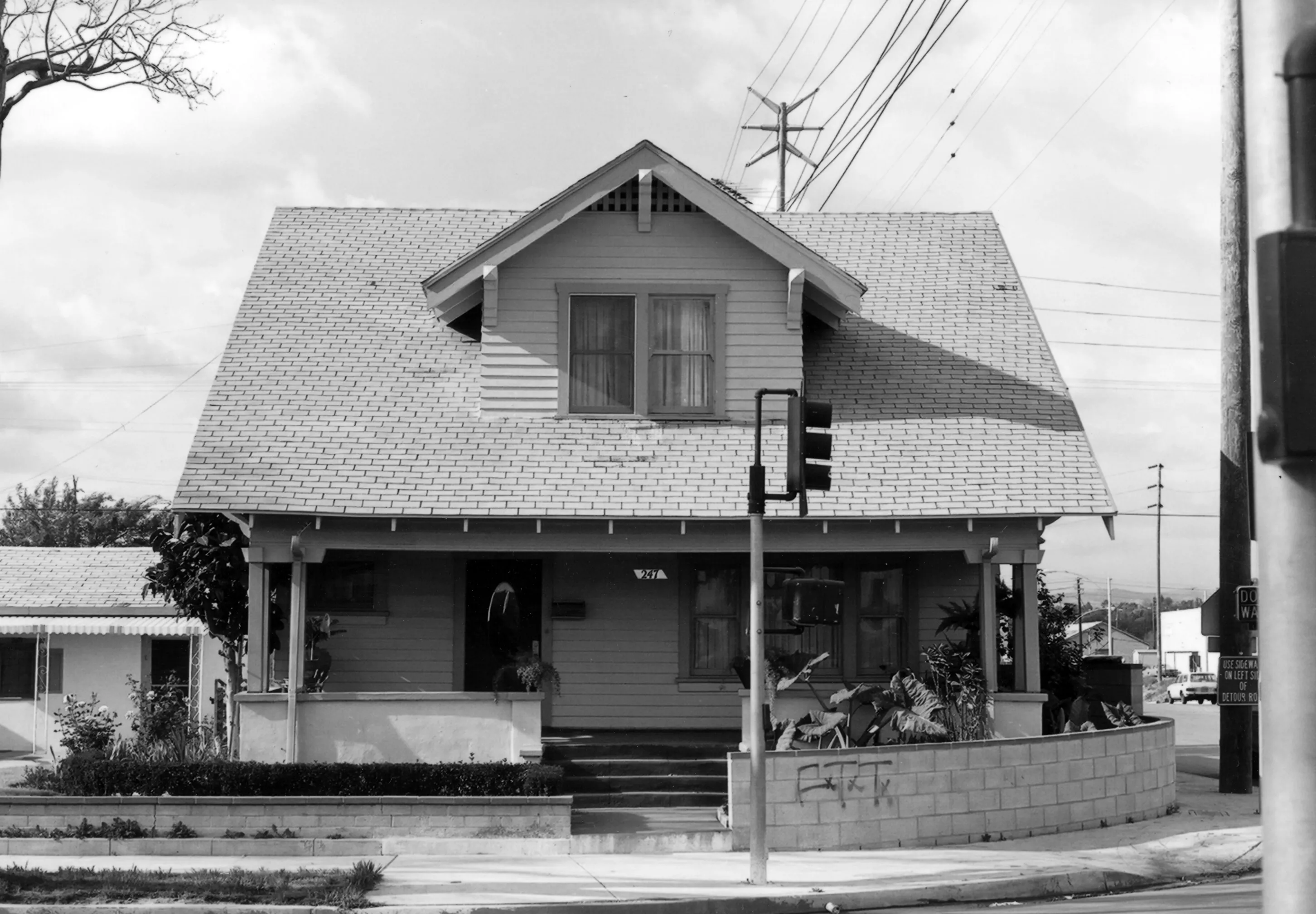 A black and white photo of the Henry Burdorf House for the Historical Building Survey in 1978.