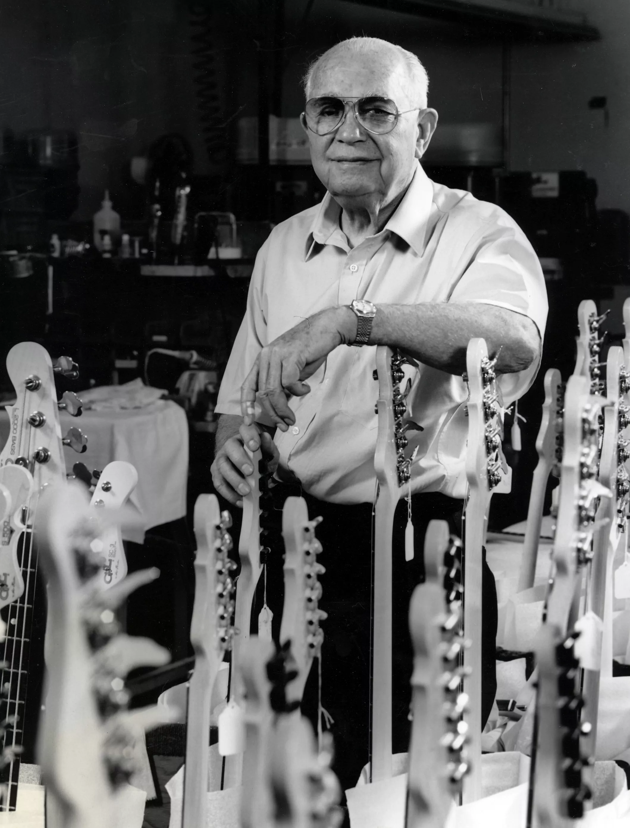 A black and white photograph of Leo Fender circa 1955.
