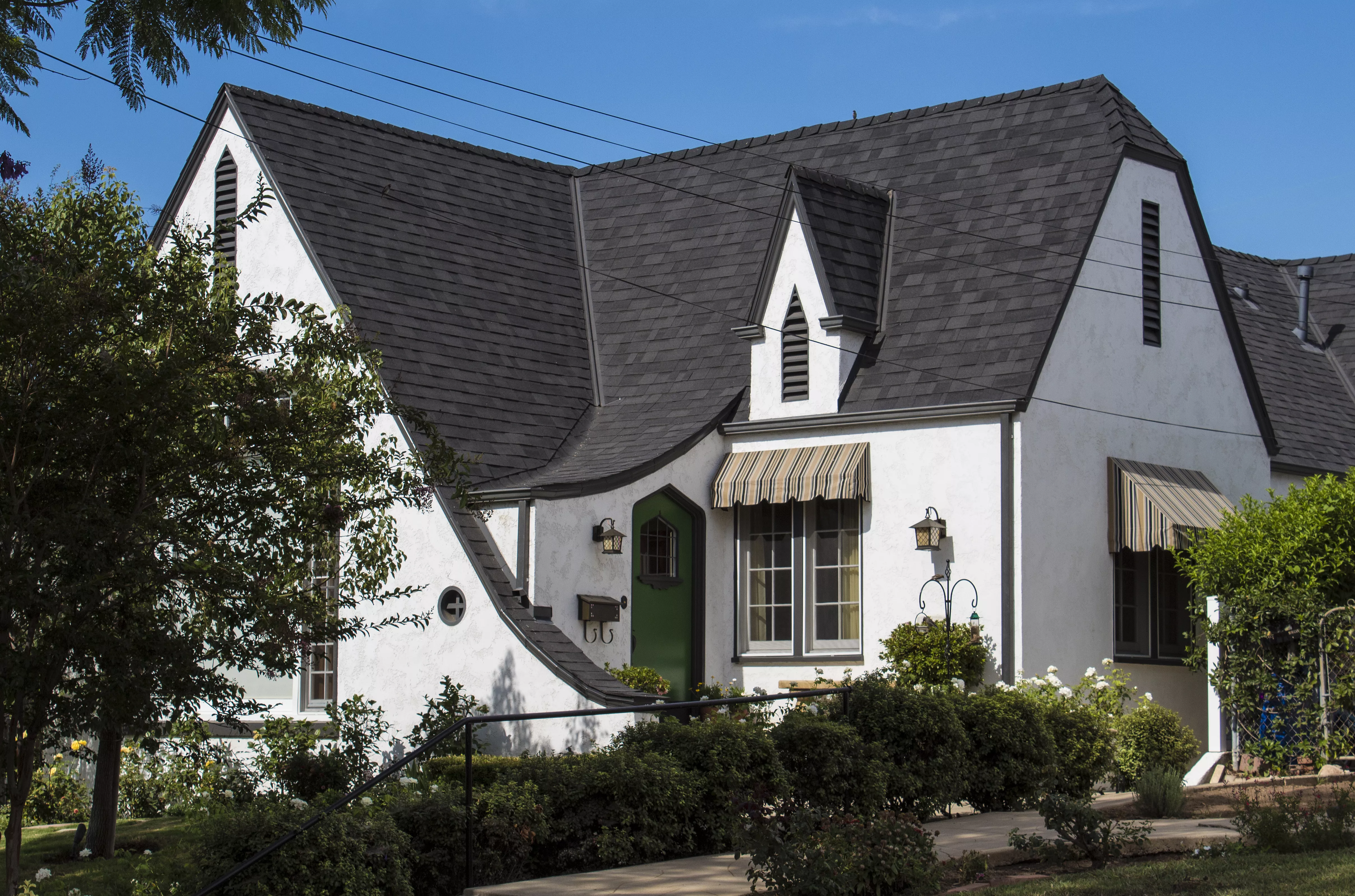 A colored photo of the north side exterior of the Model Home of 1927 in 2017.