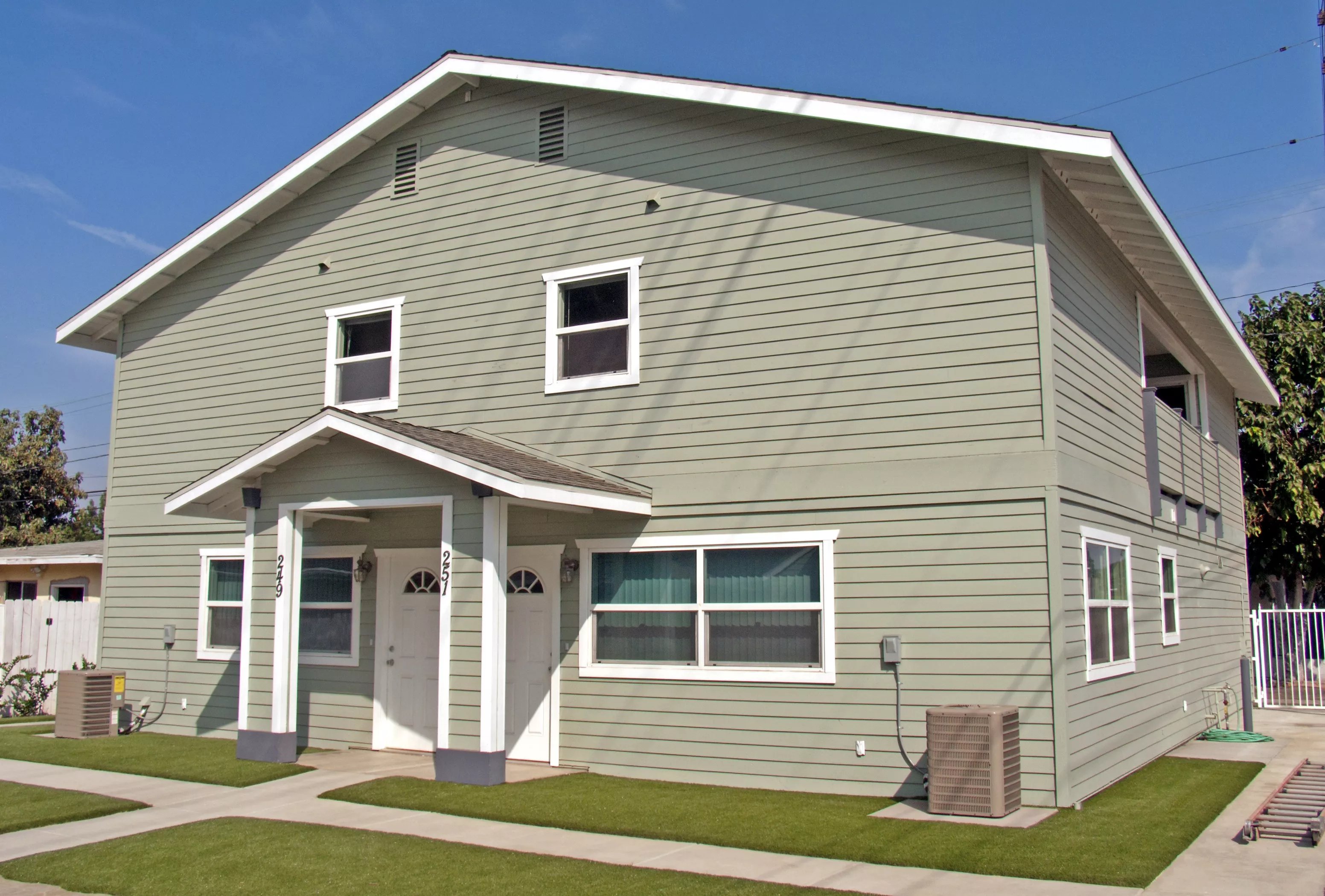 A colored photo of the rear duplex of the Henry Burdorf House in 2012.