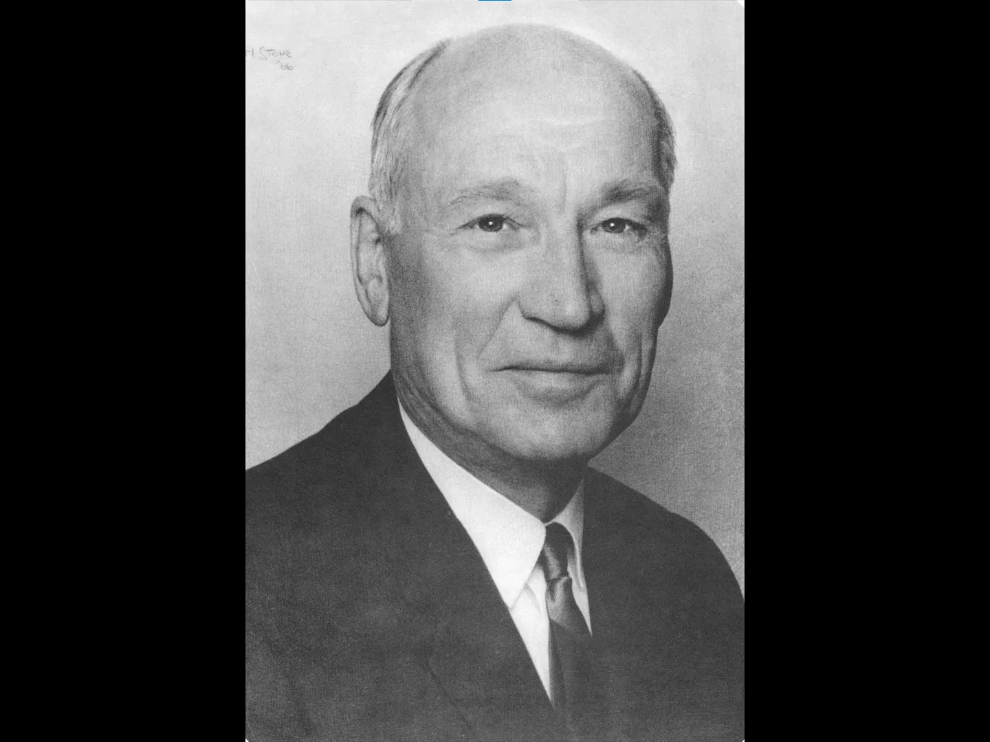 A black and white portrait photograph of Arnold Beckman.