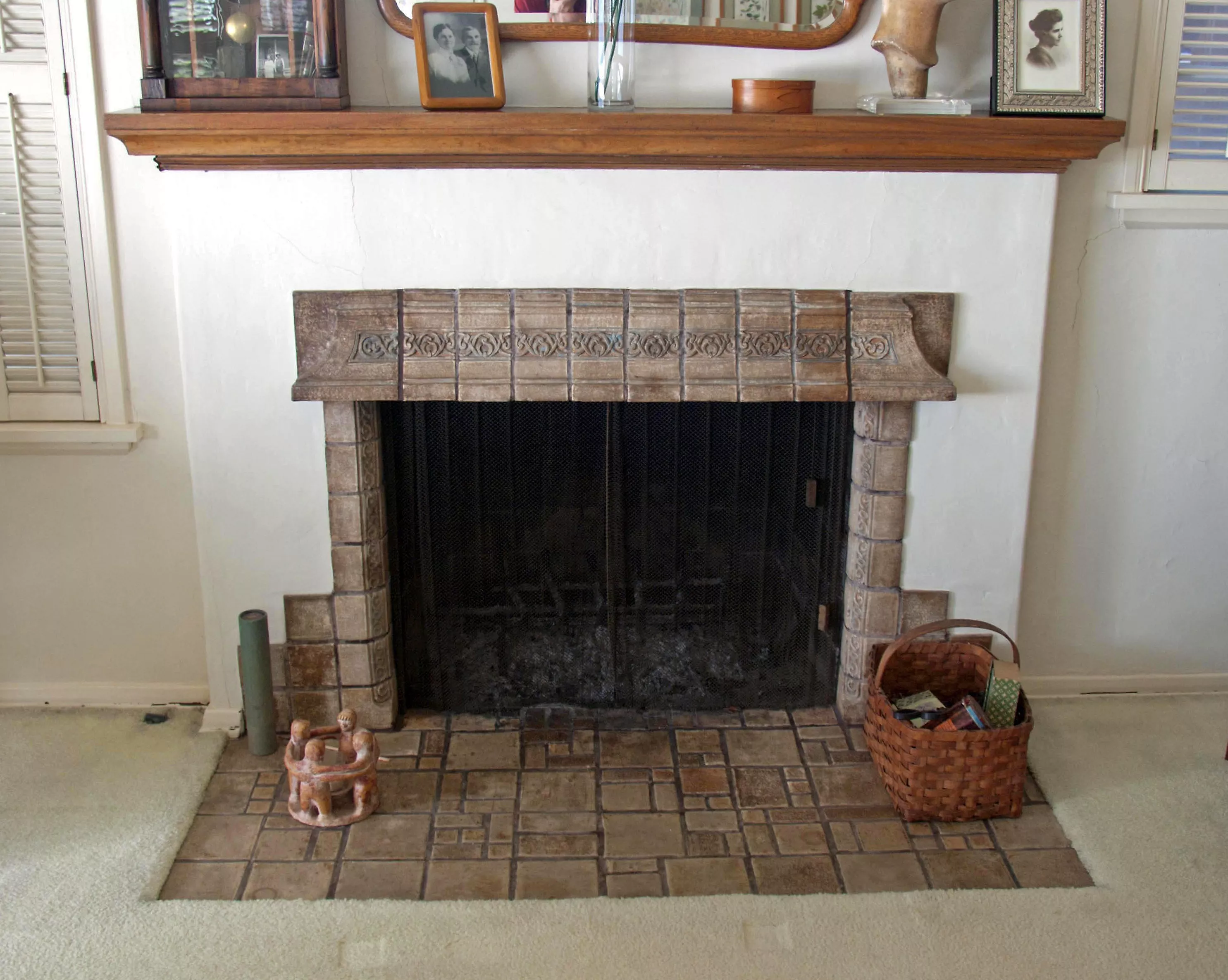 A colored photo of the Batchelder fireplace inside the Arthur Thompson House in 2017.