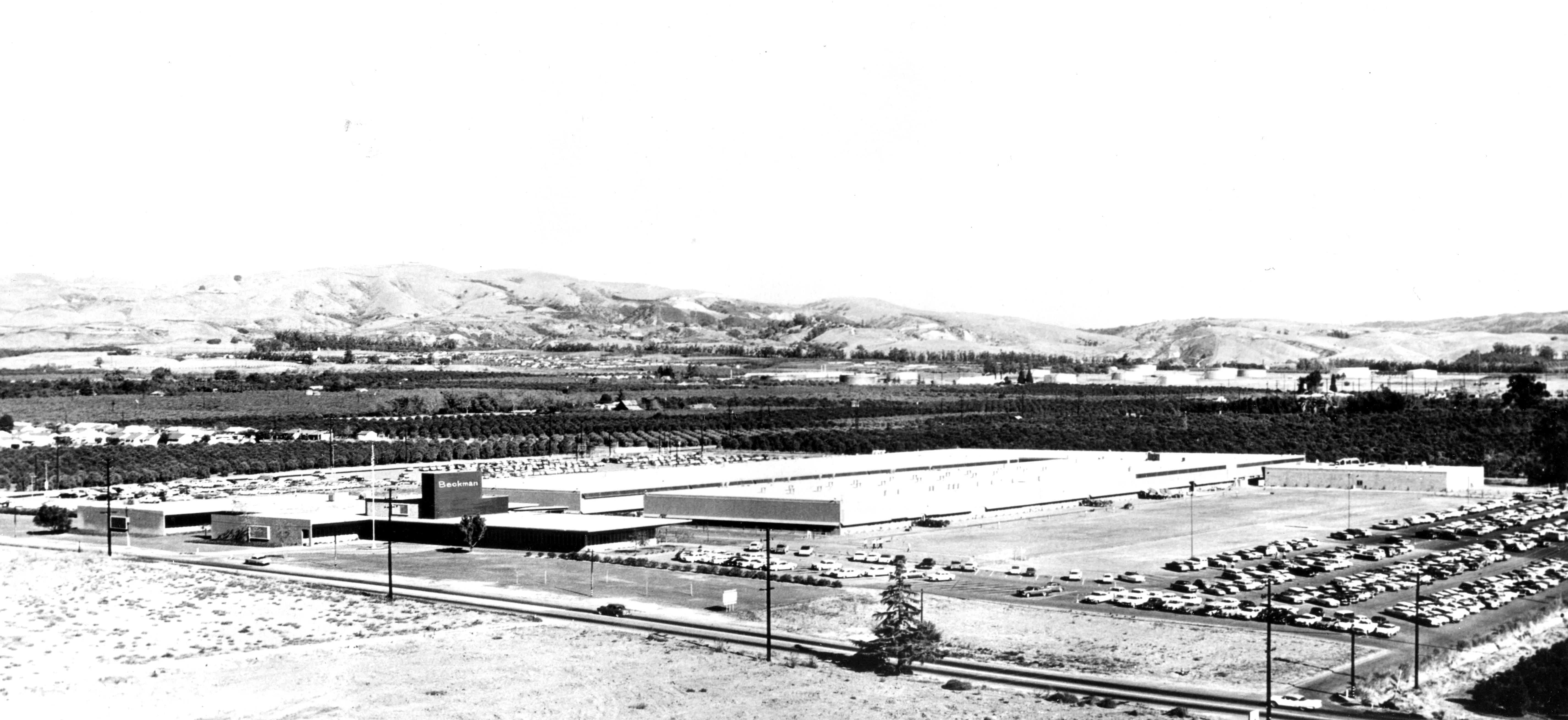 A black and white bird&#039;s-eye view photograph of the Beckman Instruments Administration Building.