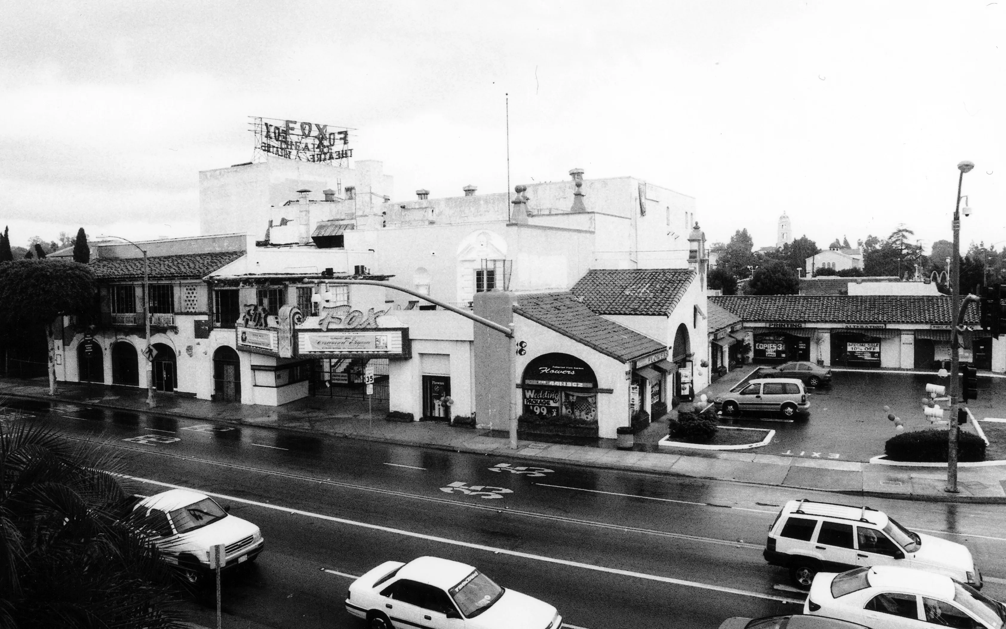 A black and white photograph from a bird&#039;s-eye view of the Firestone Tire Service Building in 2005.