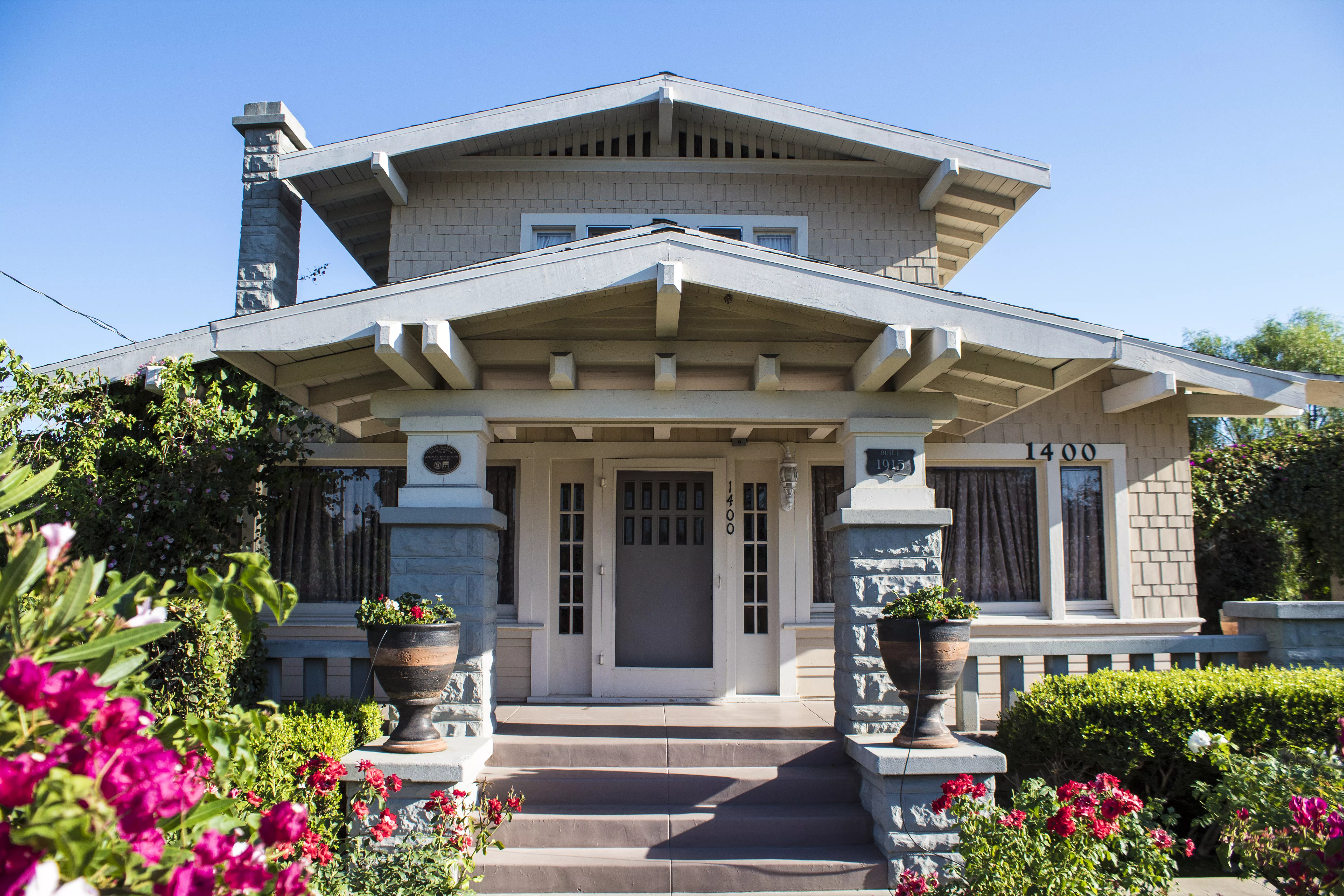 A colored photo of the Clarence Spencer House in 2017.