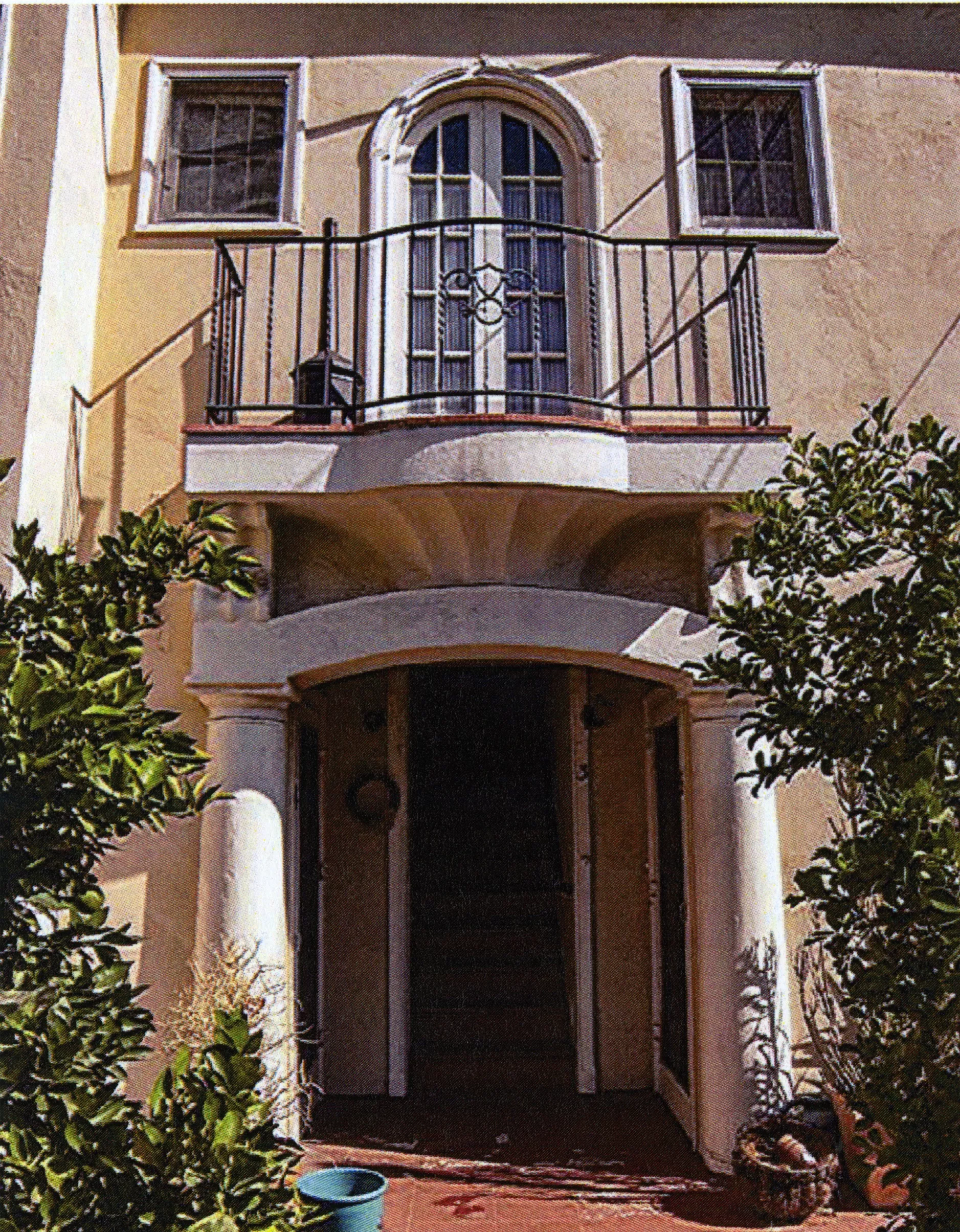 A colored photo of the front of a second-story unit of the Sans Souci Court in 2017.