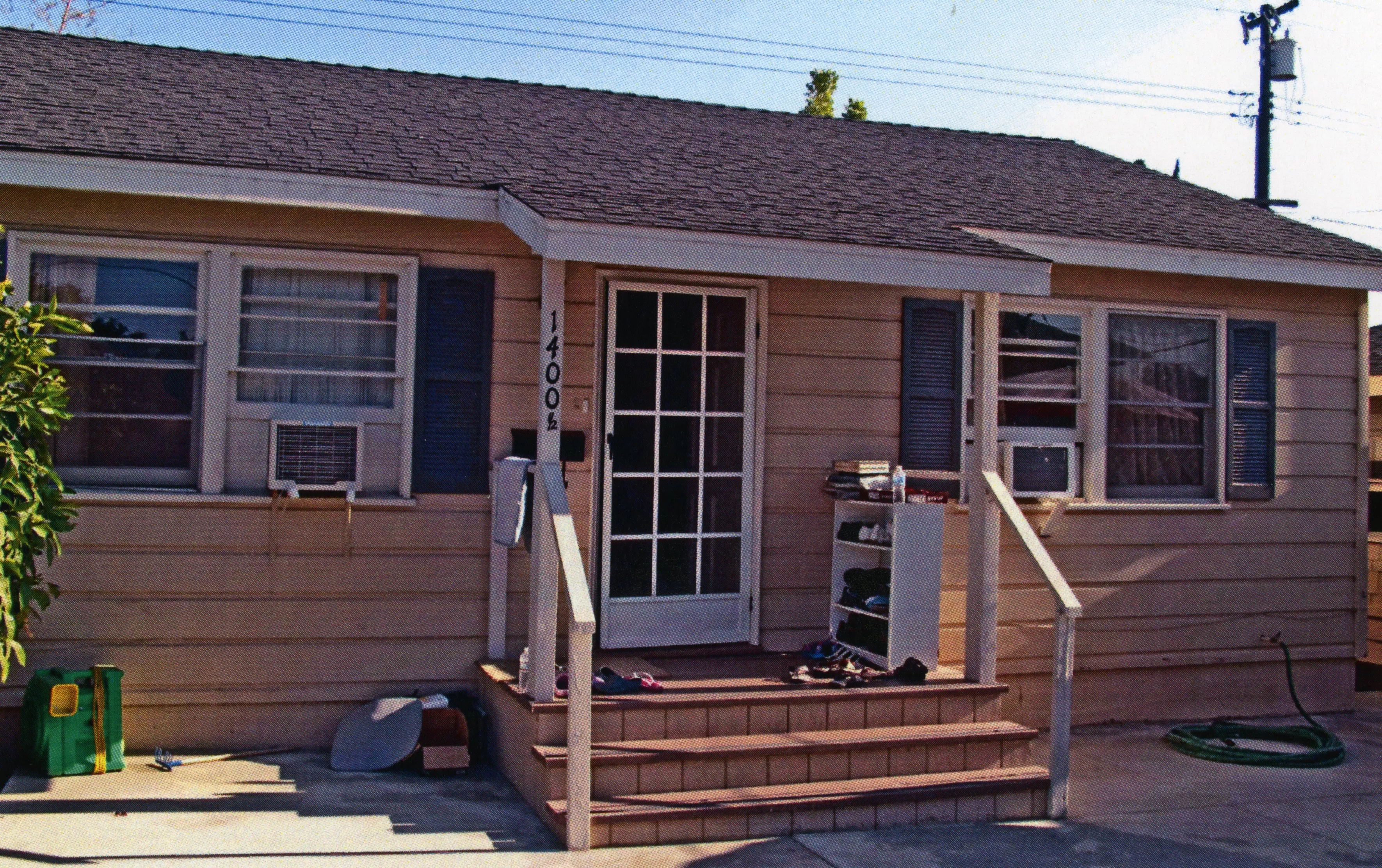 A colored photo of the guest residence for the Clarence Spencer House in 2013.
