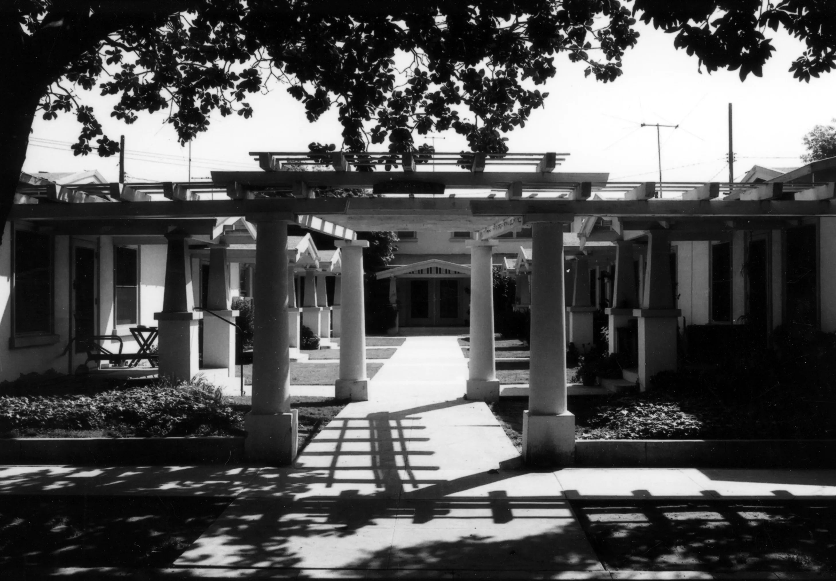 A black and white photograph of the Pomona Court for the Historical Building Survey in 1978.