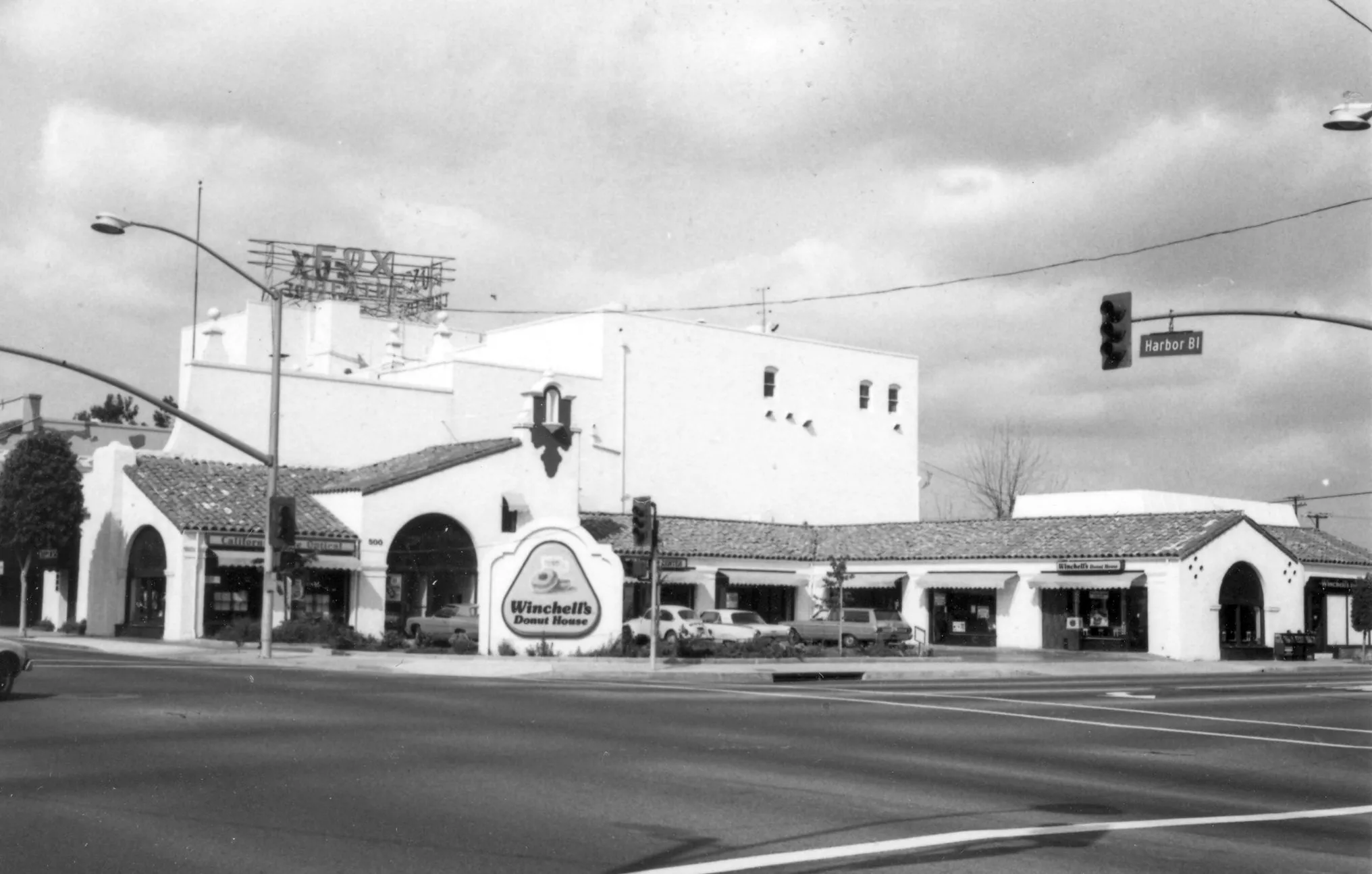A black and white photograph of the Firestone Tire Service Building for the Historical Building Survey in 1978.