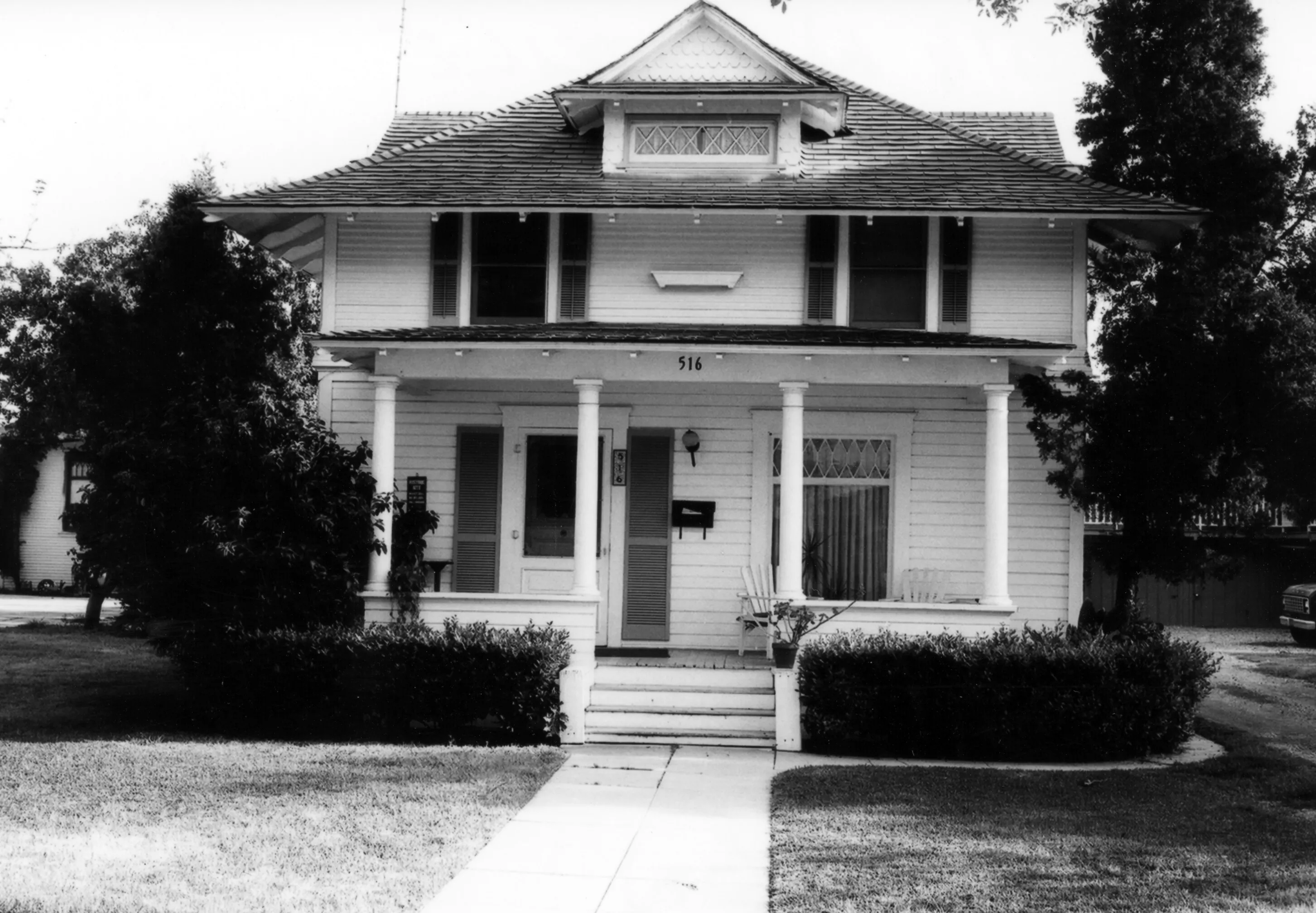A black and white photograph of the Herman Russell House for the Historical Building Survey in 1978.